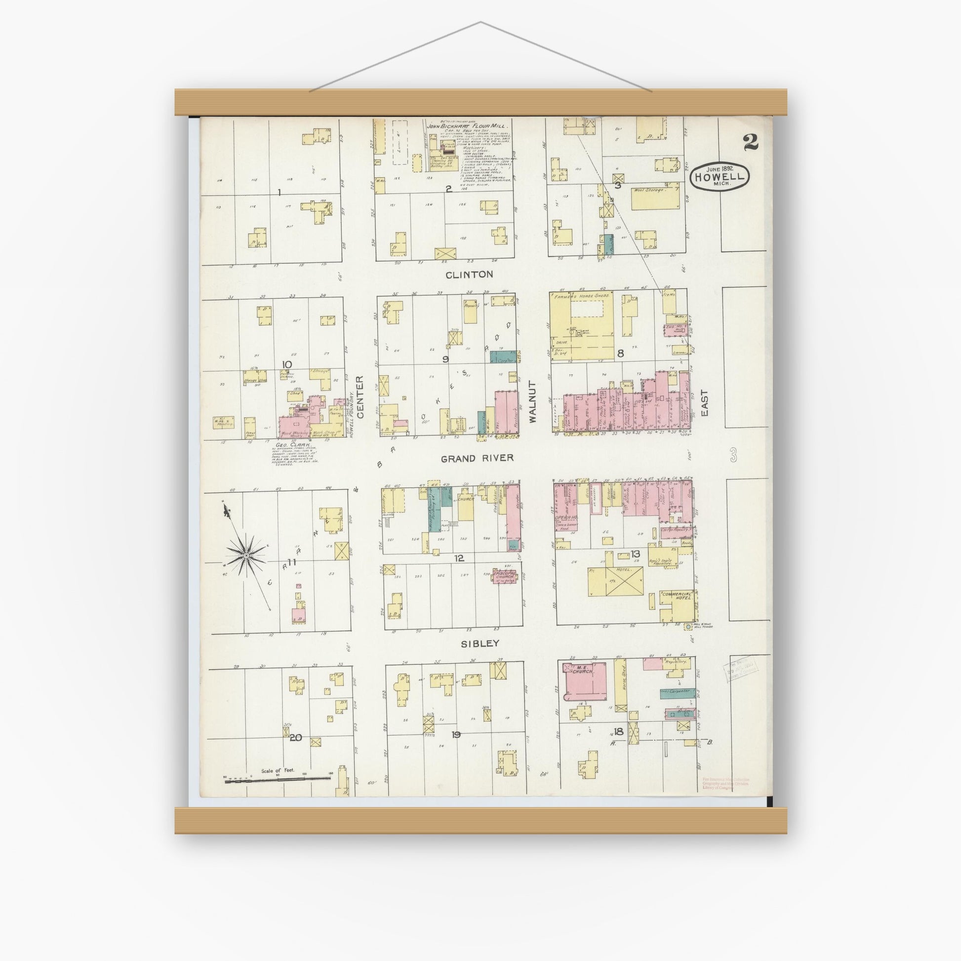 Old map wall art mockup — magnetic wood frame on white wall — Sanborn Fire Insurance Map from Howell, Livingston County, Michigan (1892), Sheet #0002