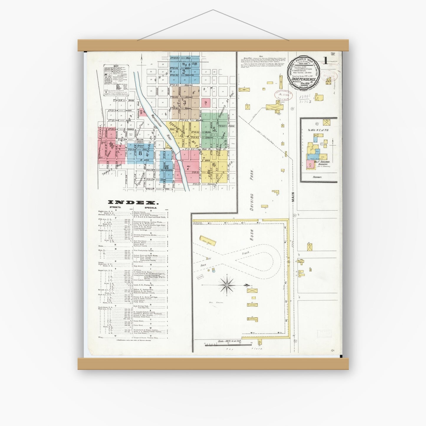 Old map wall art mockup — magnetic wood frame on white wall — Sanborn Fire Insurance Map from Independence, Buchanan County, Iowa (1899) â€” Complete Set