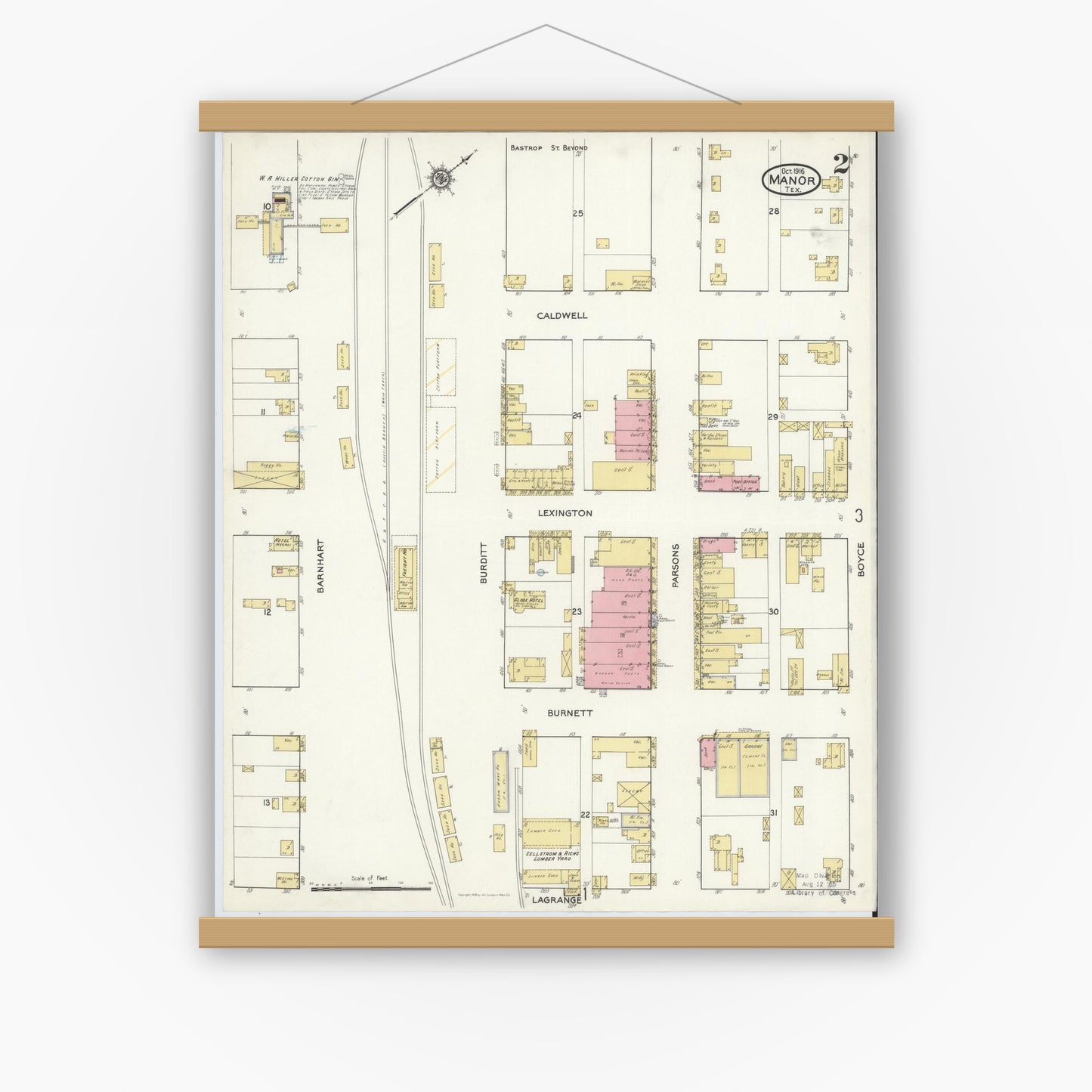 Old map wall art mockup — magnetic wood frame on white wall — Sanborn Fire Insurance Map from Manor, Travis County, Texas (1916), Sheet #0002