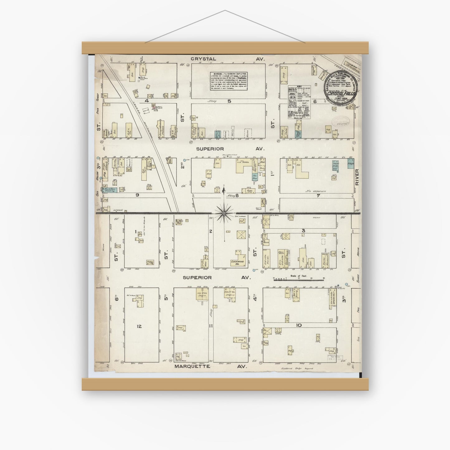 Old map wall art mockup — magnetic wood frame on white wall — Sanborn Fire Insurance Map from Crystal Falls, Iron County, Michigan (1884), Sheet #0001