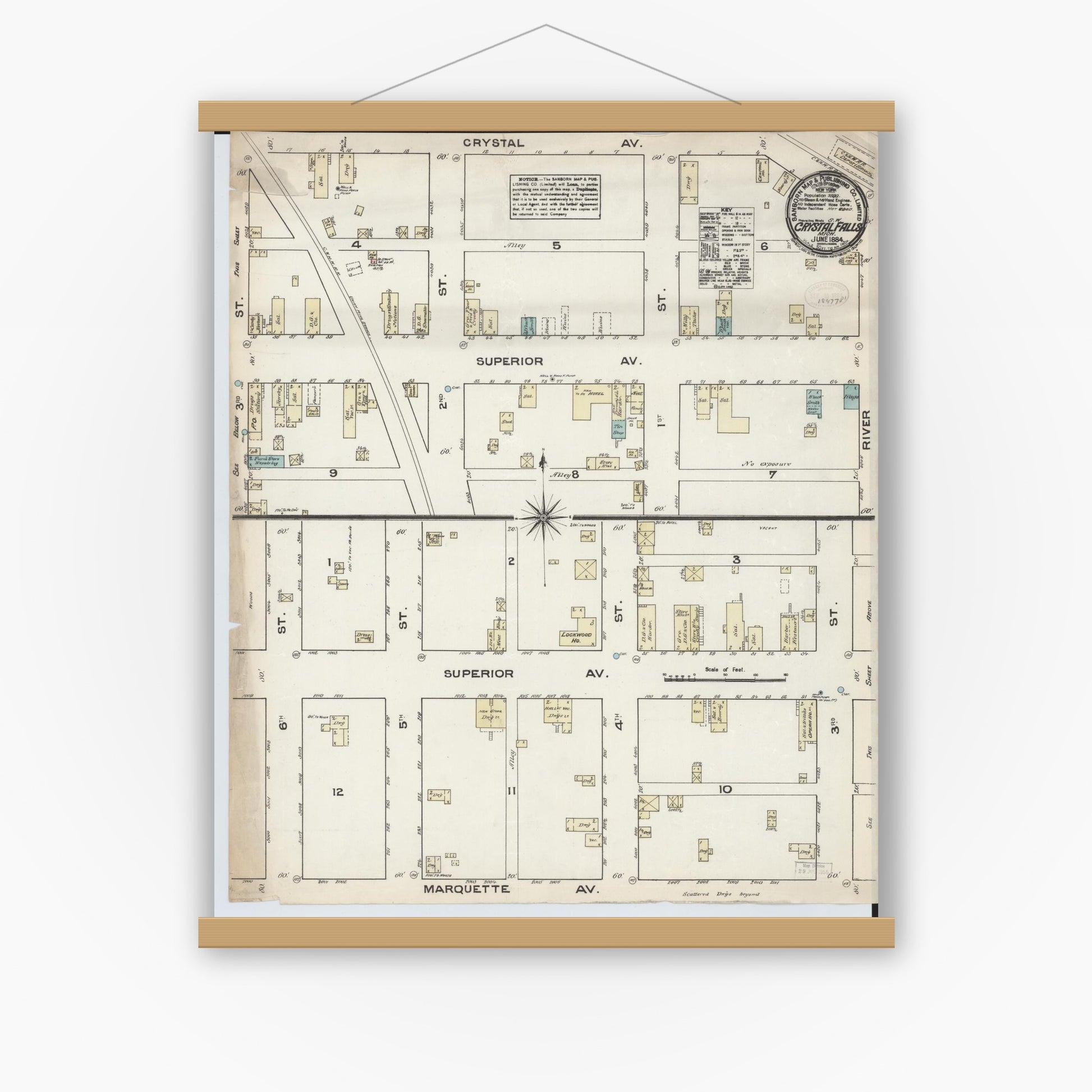 Old map wall art mockup — magnetic wood frame on white wall — Sanborn Fire Insurance Map from Crystal Falls, Iron County, Michigan (1884), Sheet #0001