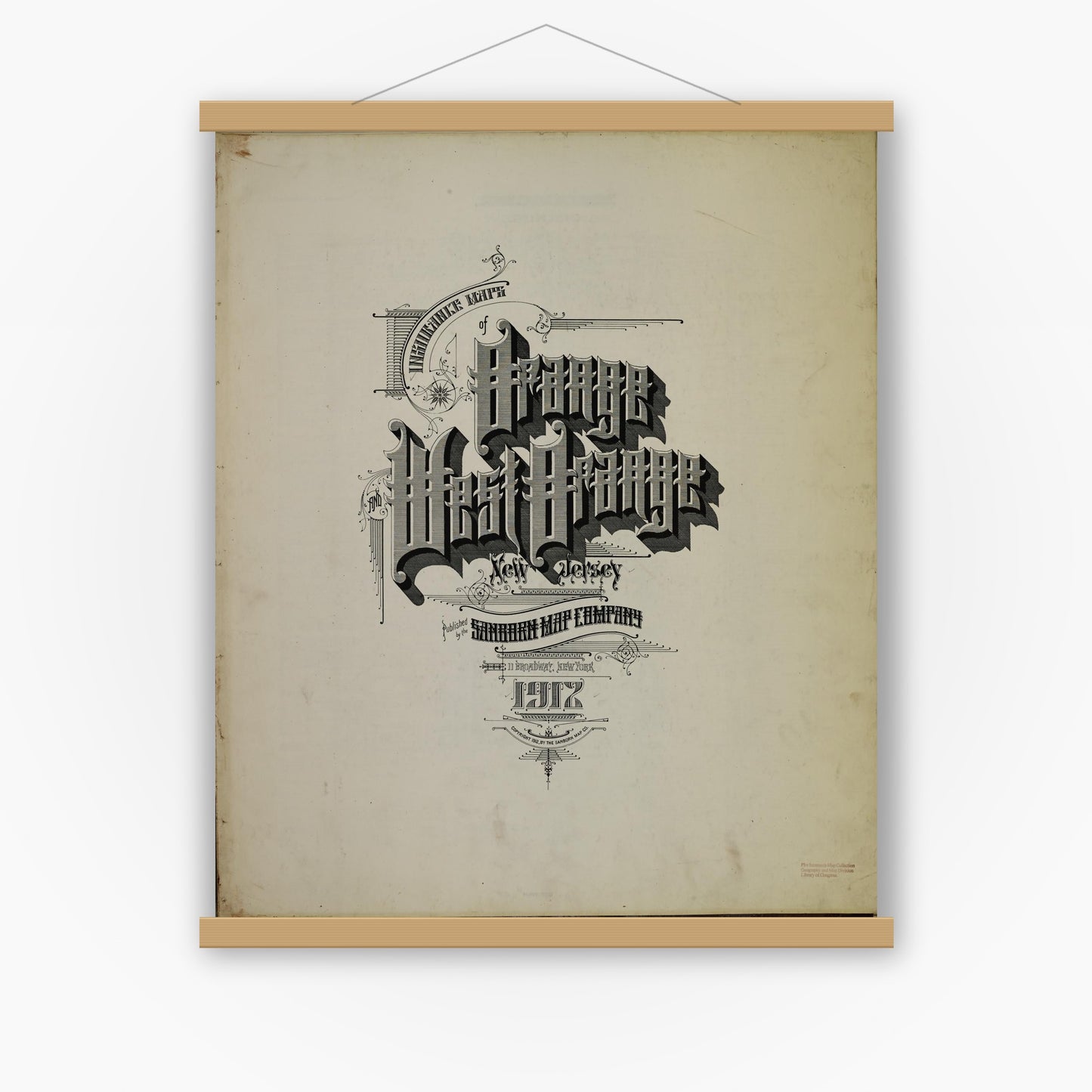 Old map wall art mockup — magnetic wood frame on white wall — Sanborn Fire Insurance Map from Orange, Essex County, New Jersey (1912), Sheet #0001