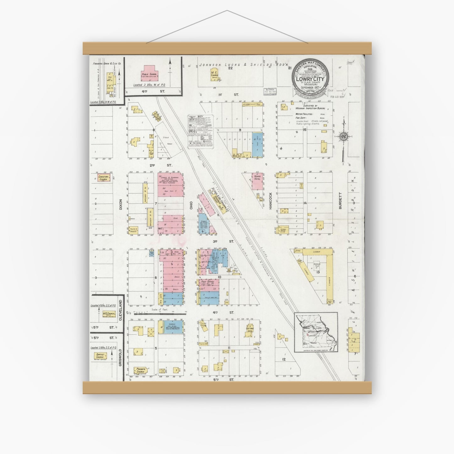 Old map wall art mockup — magnetic wood frame on white wall — Sanborn Fire Insurance Map from Lowry City, Saint Clair County, Missouri (1927), Sheet #0001