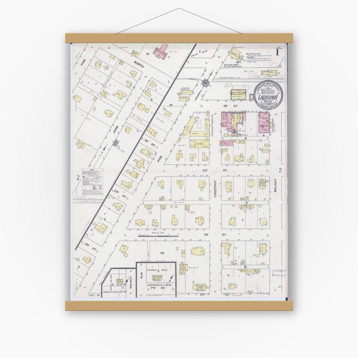 Old map wall art mockup — magnetic wood frame on white wall — Sanborn Fire Insurance Map from Laddonia, Audrain County, Missouri (1909) - Complete Map Set
