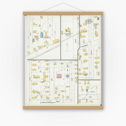 Old map wall art mockup — magnetic wood frame on white wall — Sanborn Fire Insurance Map from Clinton, Rock County, Wisconsin (1899), Sheet #0002