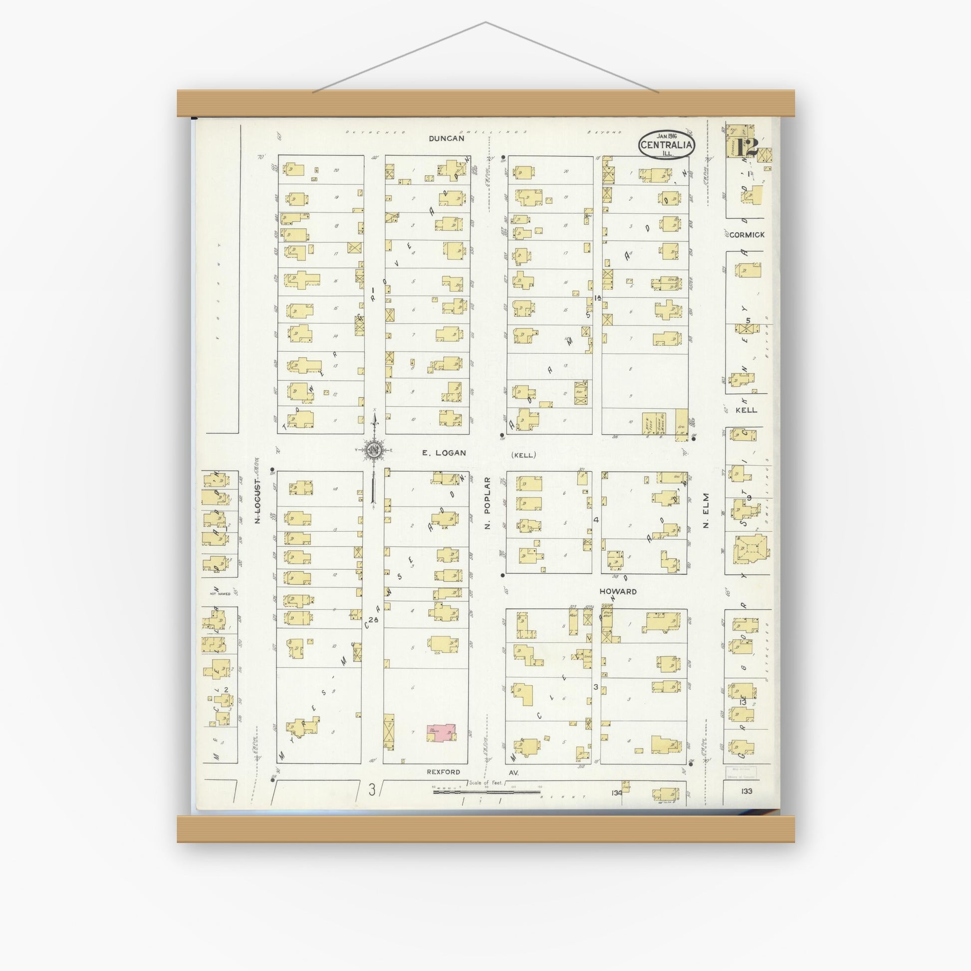 Old map wall art mockup — magnetic wood frame on white wall — Sanborn Fire Insurance Map from Centralia, Marion, Clinton, Jefferson, and Washington Counties, Illinois (1916), Sheet #0012