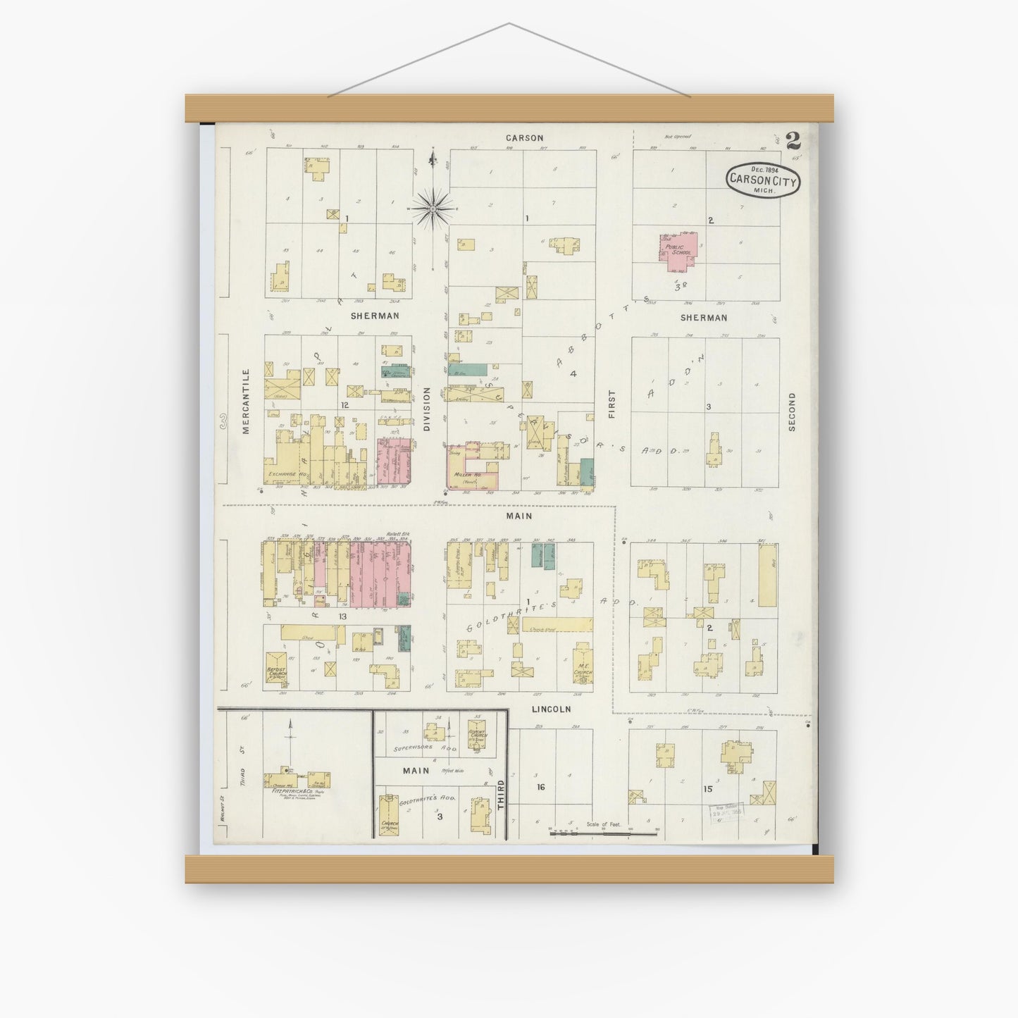 Old map wall art mockup — magnetic wood frame on white wall — Sanborn Fire Insurance Map from Carson City, Montcalm County, Michigan (1894), Sheet #0002