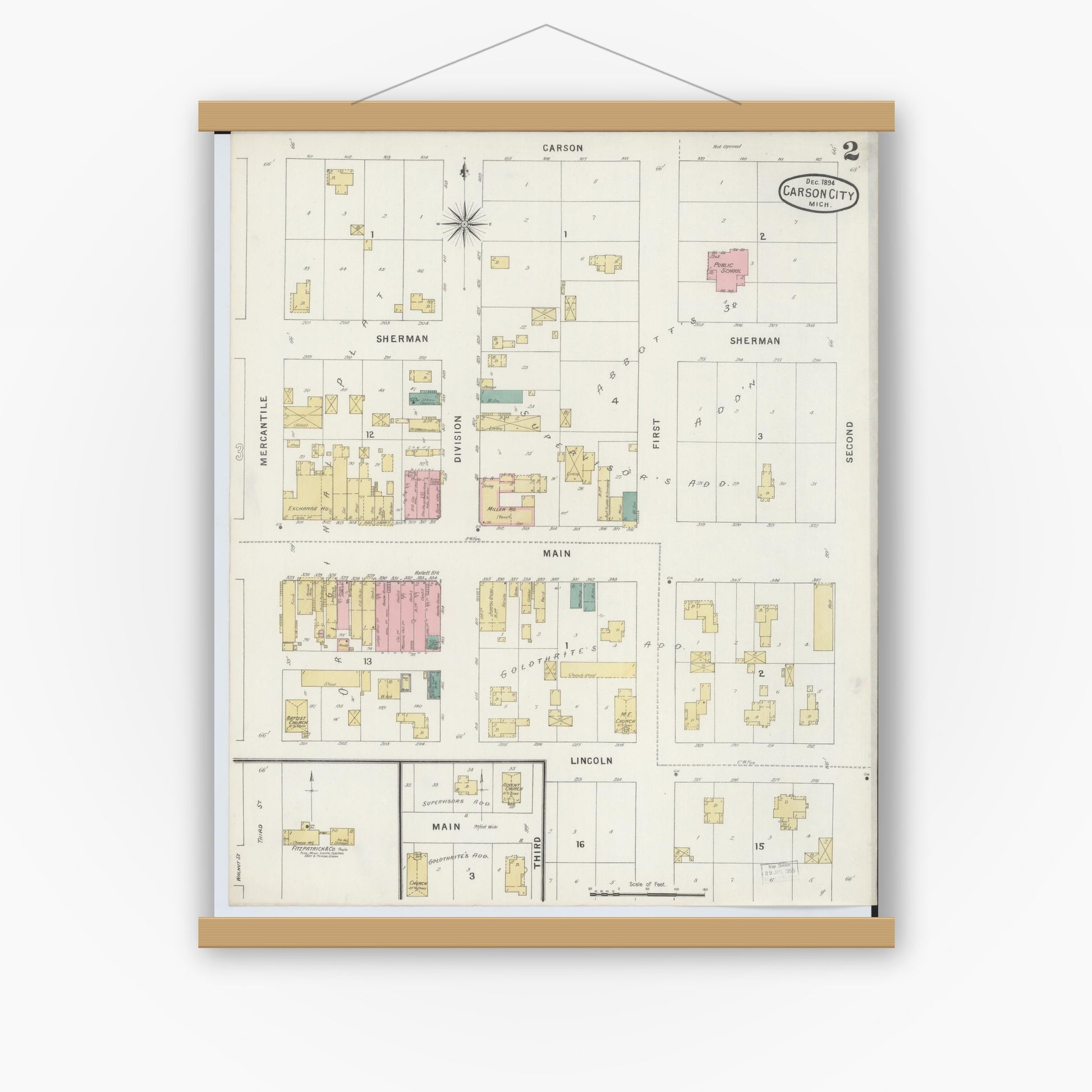 Old map wall art mockup — magnetic wood frame on white wall — Sanborn Fire Insurance Map from Carson City, Montcalm County, Michigan (1894), Sheet #0002