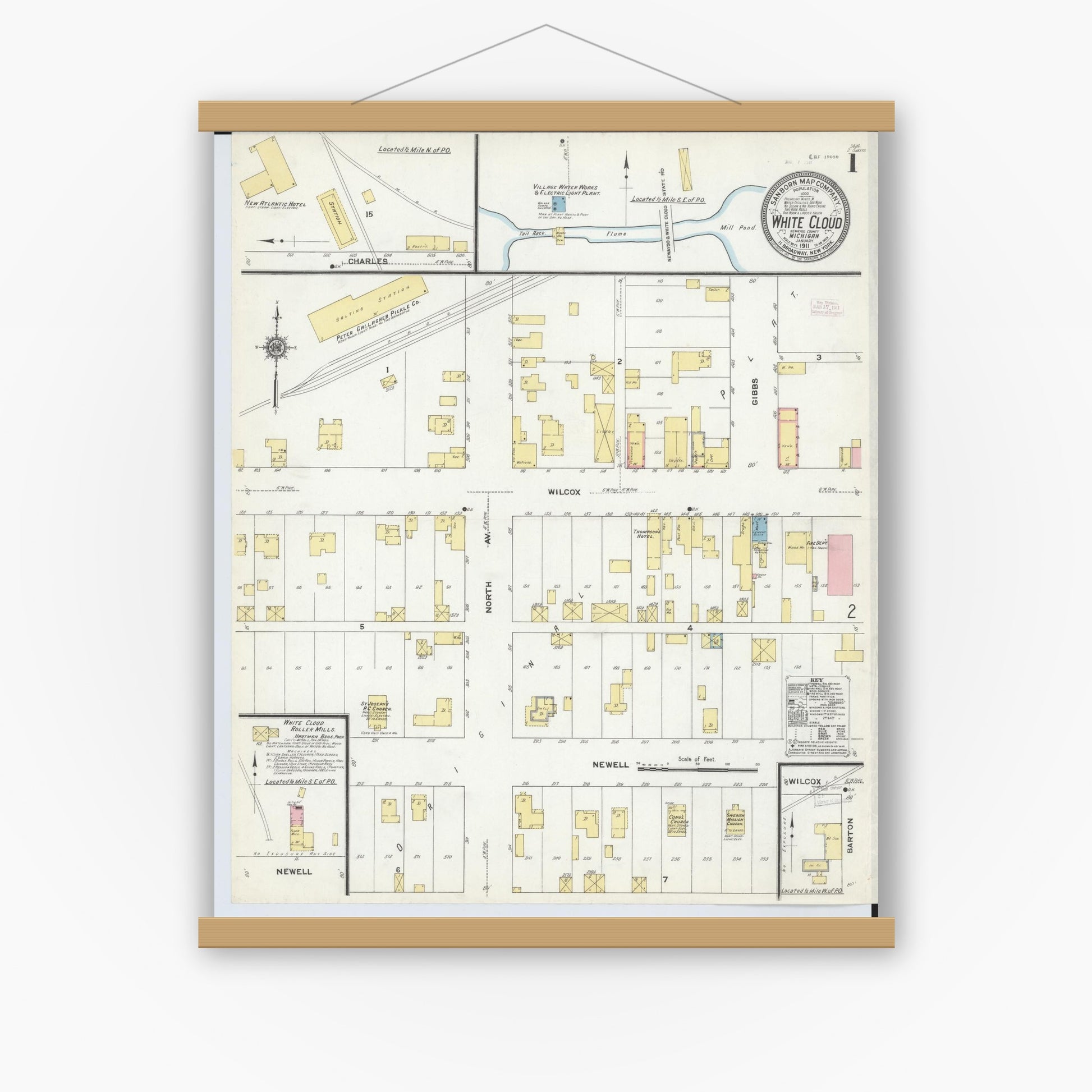 Old map wall art mockup — magnetic wood frame on white wall — Sanborn Fire Insurance Map from White Cloud, Newaygo County, Michigan (1911), Sheet #0001