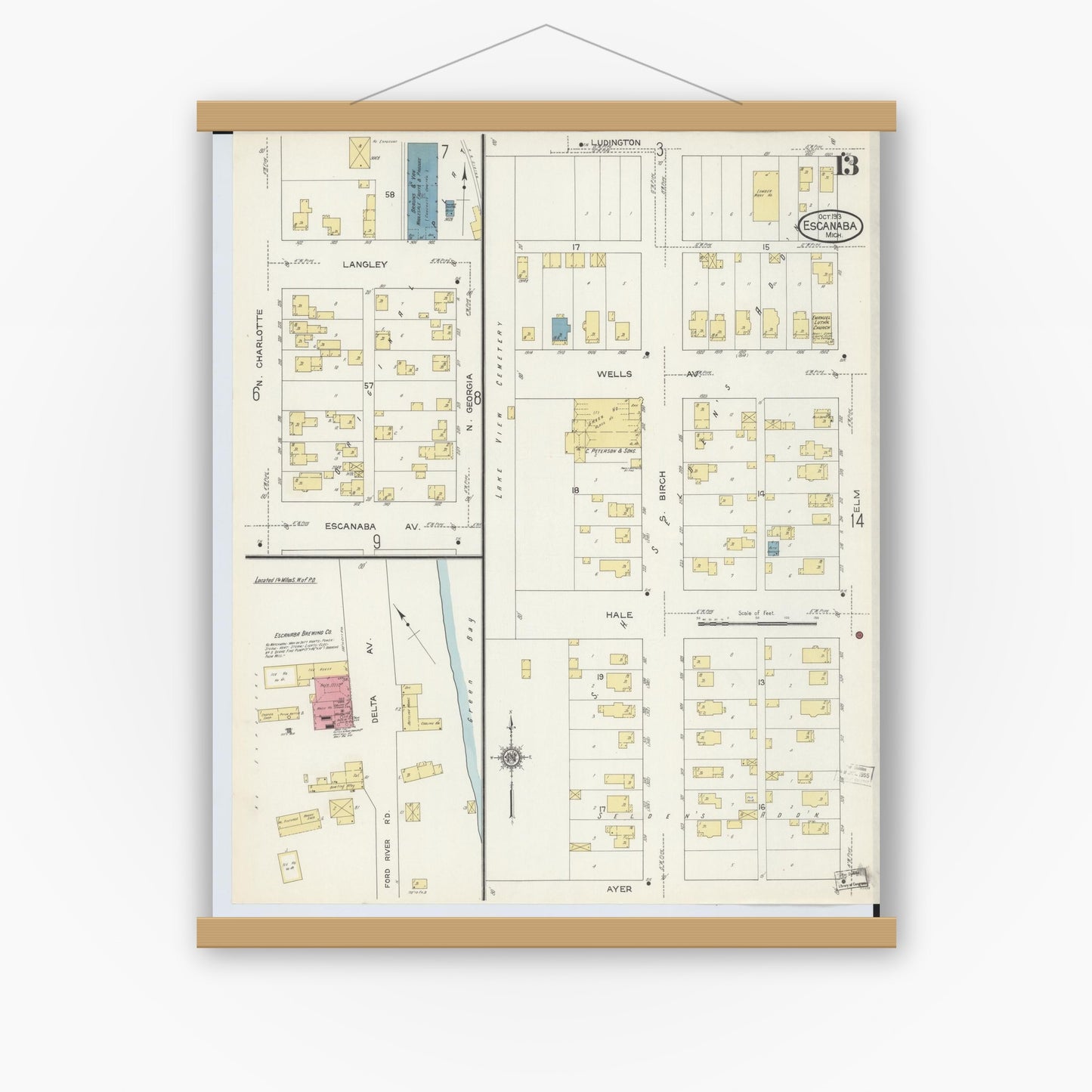 Old map wall art mockup — magnetic wood frame on white wall — Sanborn Fire Insurance Map from Escanaba, Delta County, Michigan (1913), Sheet #0013