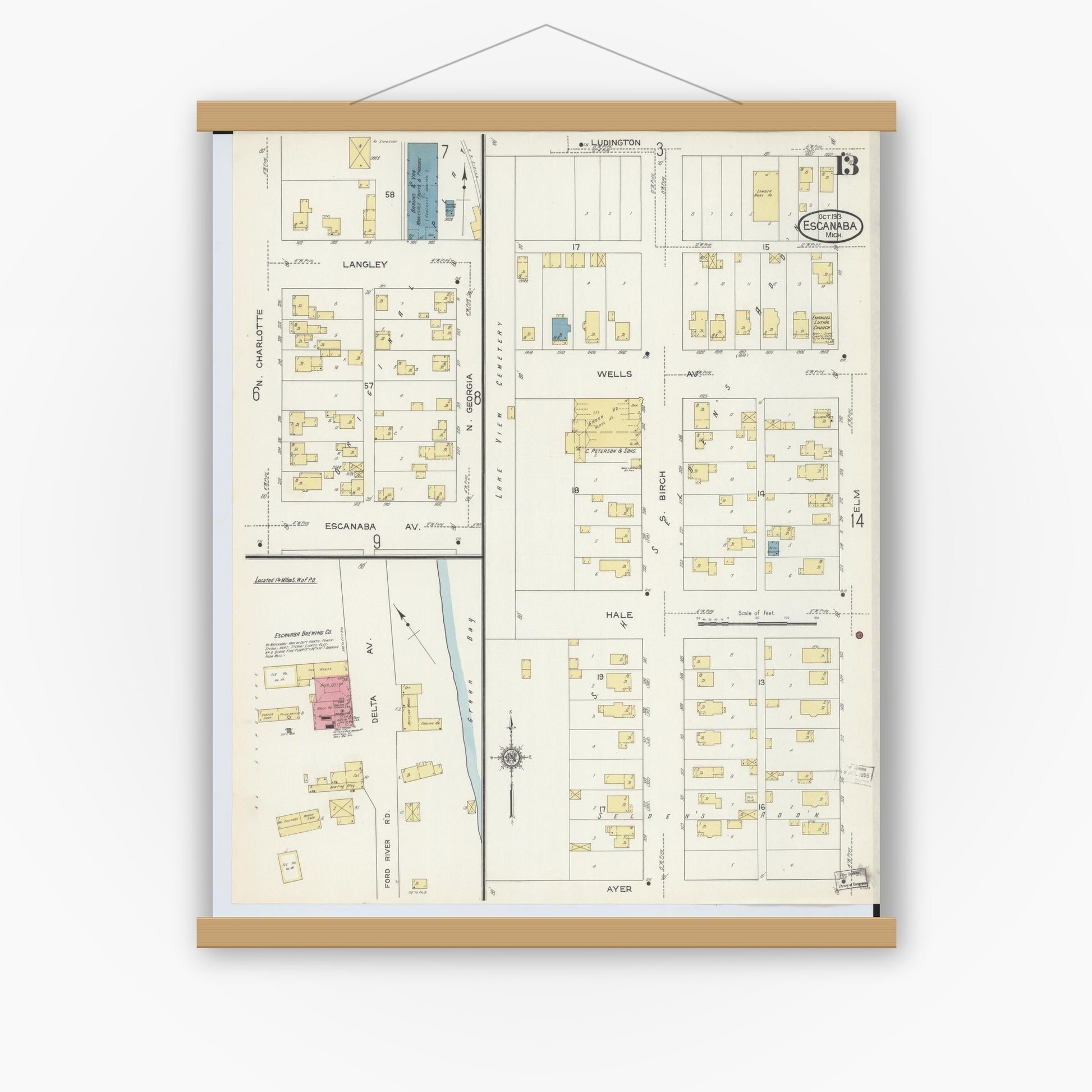 Old map wall art mockup — magnetic wood frame on white wall — Sanborn Fire Insurance Map from Escanaba, Delta County, Michigan (1913), Sheet #0013