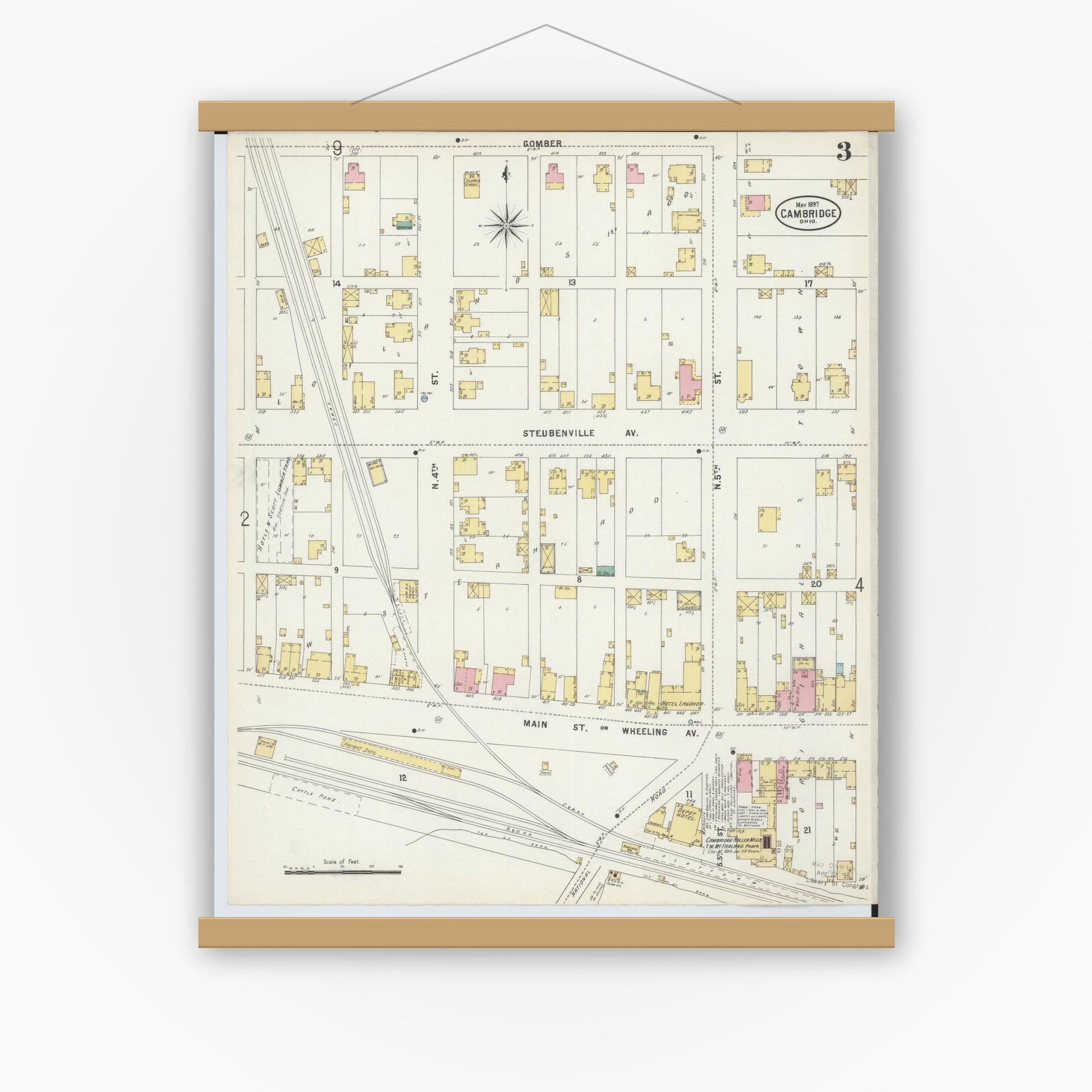 Old map wall art mockup — magnetic wood frame on white wall — Sanborn Fire Insurance Map from Cambridge, Guernsey County, Ohio (1897), Sheet #0003