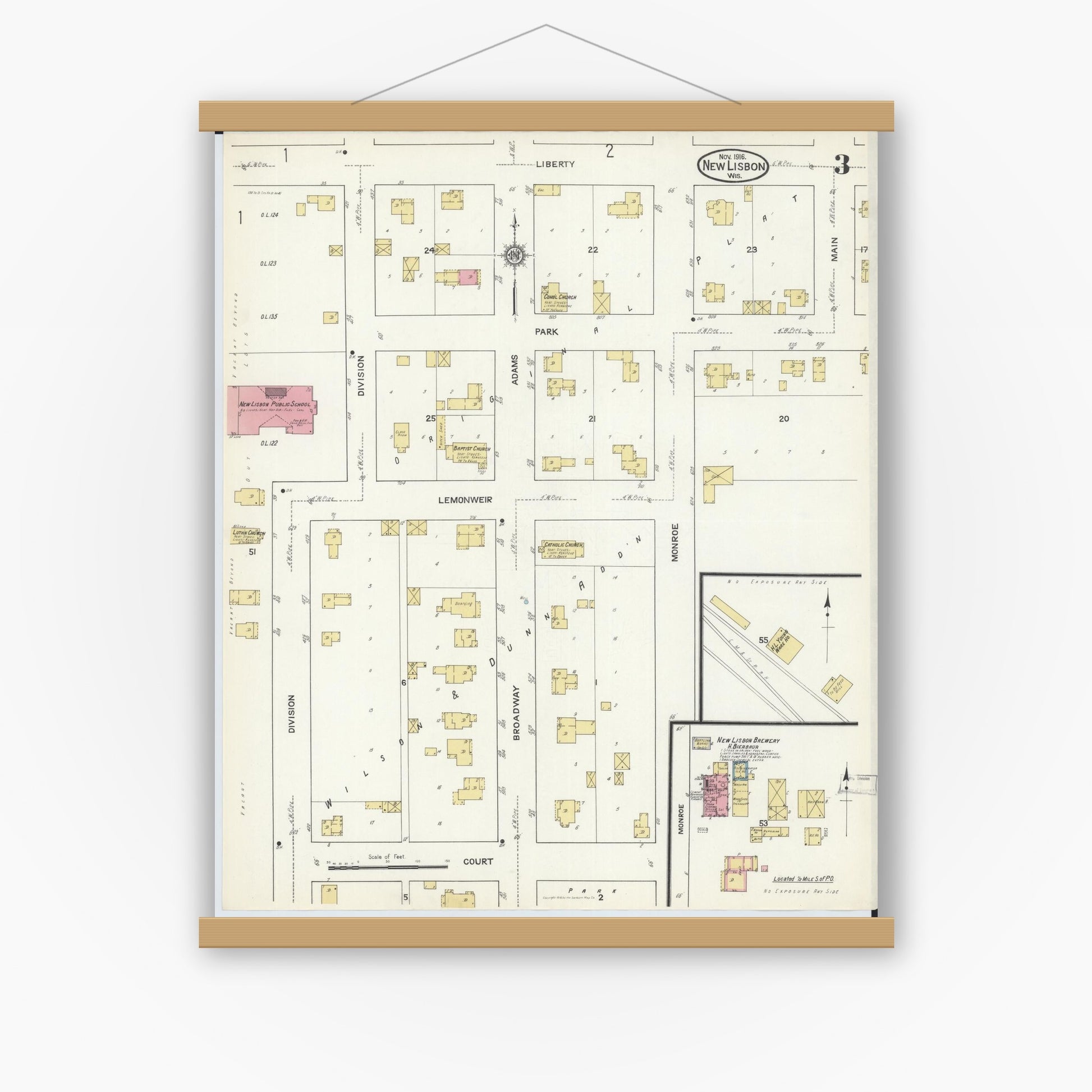 Old map wall art mockup — magnetic wood frame on white wall — Sanborn Fire Insurance Map from New Lisbon, Juneau County, Wisconsin (1916), Sheet #0003