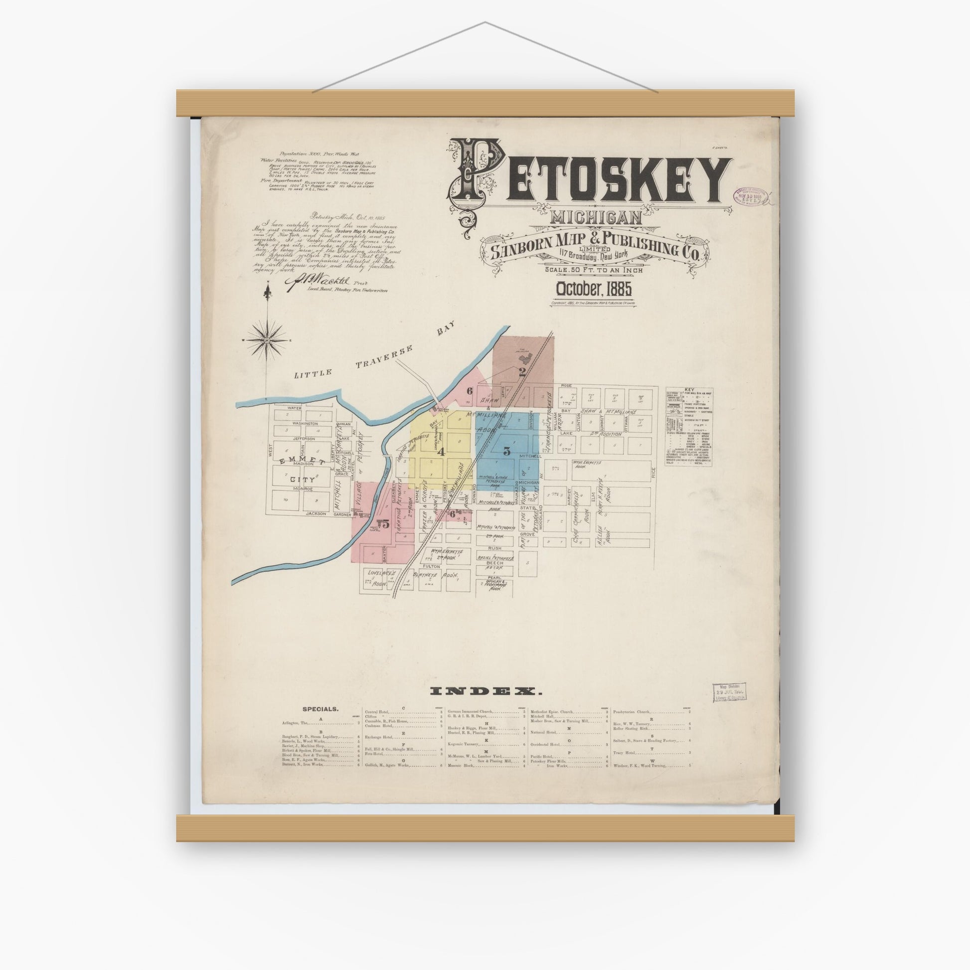 Old map wall art mockup — magnetic wood frame on white wall — Sanborn Fire Insurance Map from Petoskey, Emmet County, Michigan (1885) - Complete Map Set
