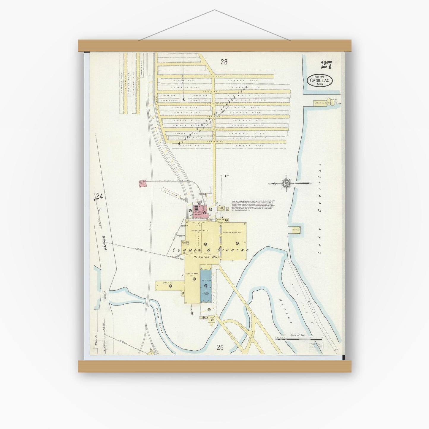 Old map wall art mockup — magnetic wood frame on white wall — Sanborn Fire Insurance Map from Cadillac, Wexford County, Michigan (1914), Sheet #0027