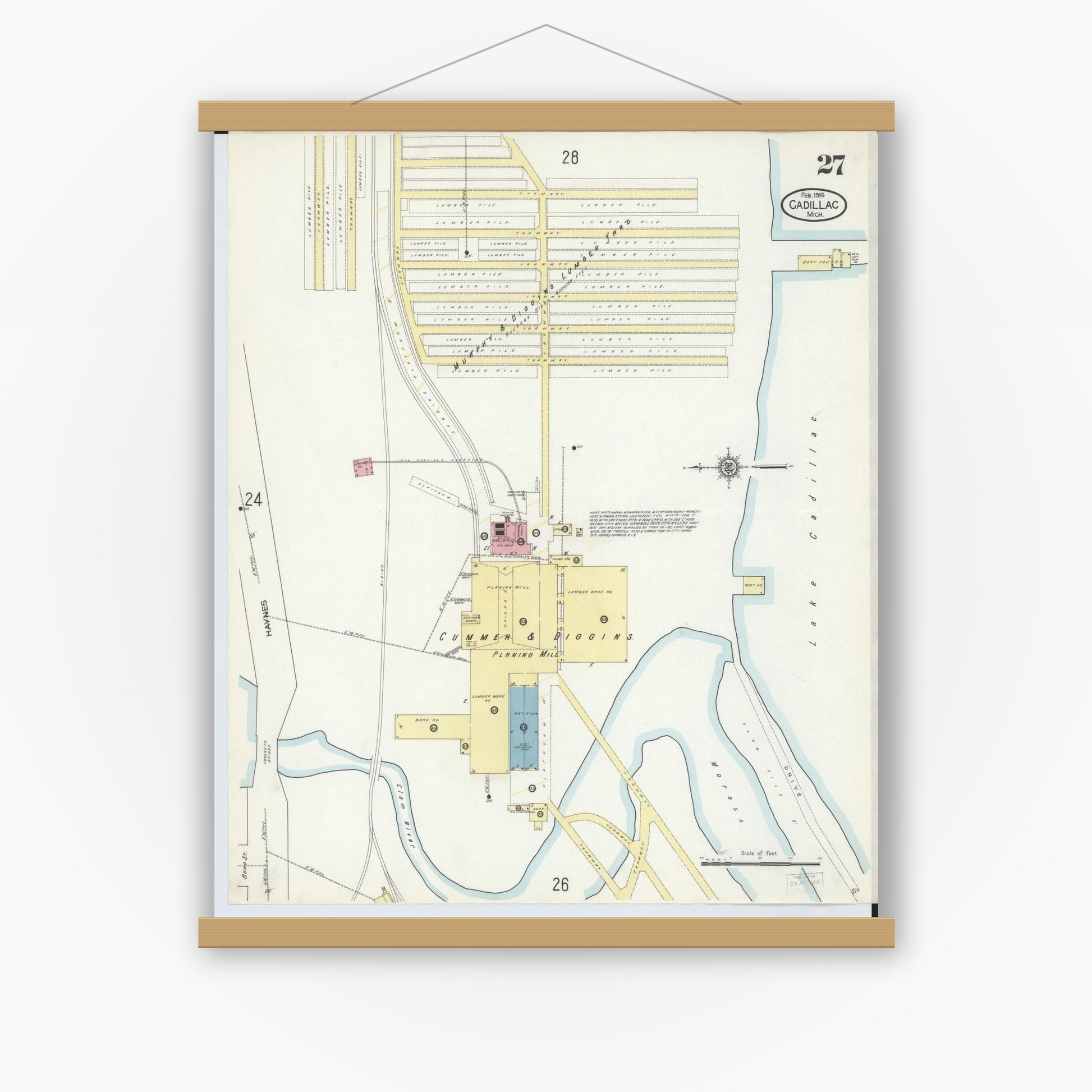 Old map wall art mockup — magnetic wood frame on white wall — Sanborn Fire Insurance Map from Cadillac, Wexford County, Michigan (1914), Sheet #0027