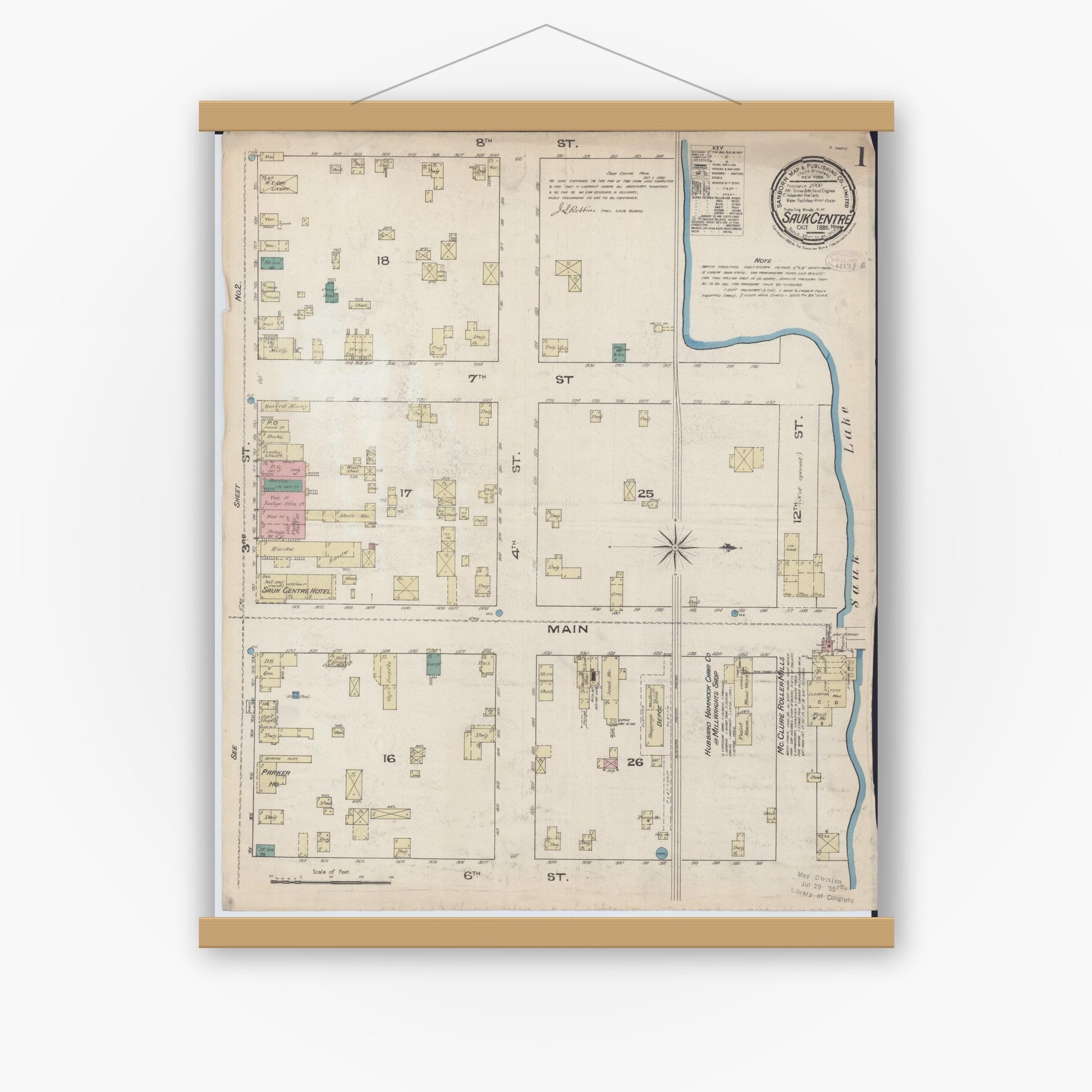 Old map wall art mockup — magnetic wood frame on white wall — Sanborn Fire Insurance Map from Sauk Centre, Stearns County, Minnesota (1885) - Complete Map Set