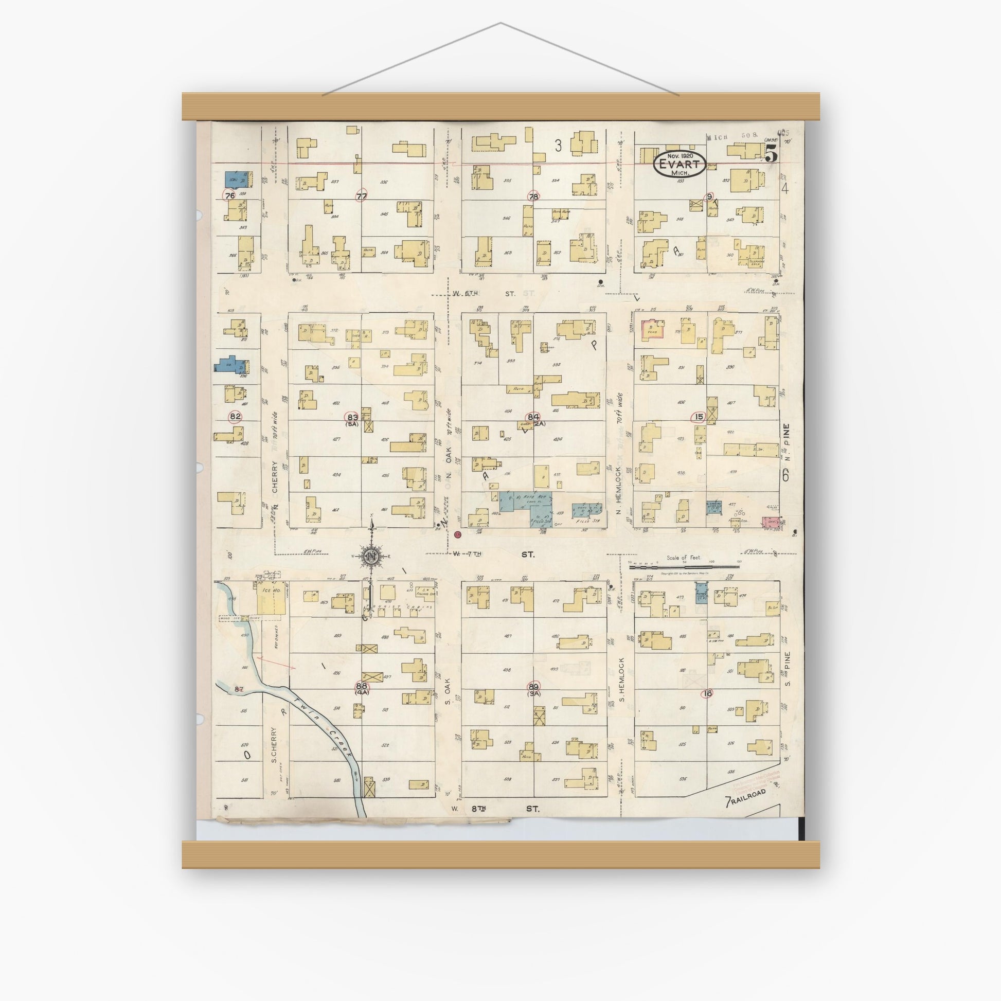 Old map wall art mockup — magnetic wood frame on white wall — Sanborn Fire Insurance Map from Evart, Osceola County, Michigan (1942), Sheet #0005