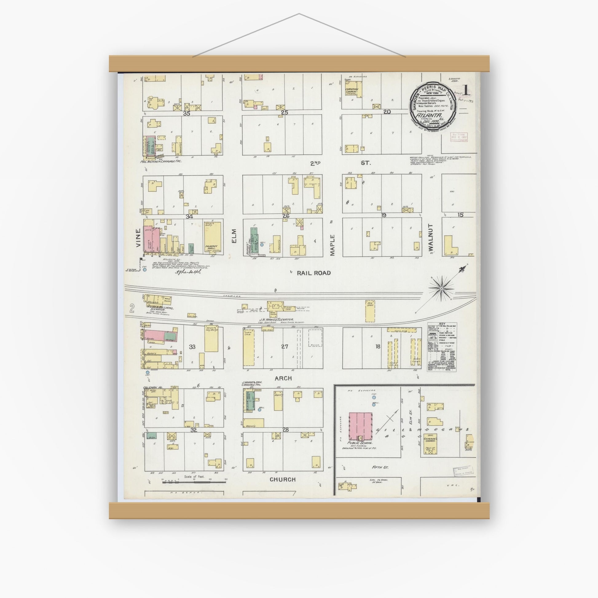 Old map wall art mockup — magnetic wood frame on white wall — Sanborn Fire Insurance Map from Atlanta, Logan County, Illinois (1892) - Complete Map Set