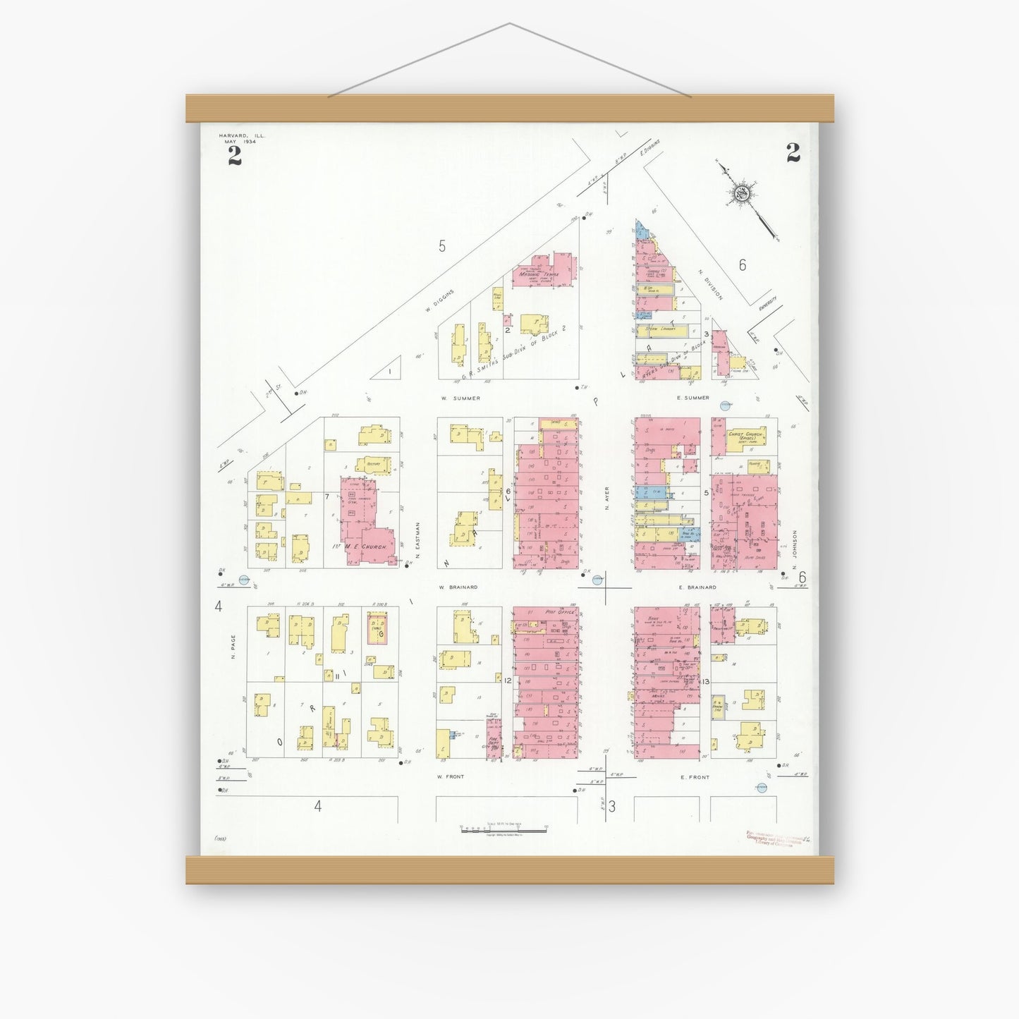 Old map wall art mockup — magnetic wood frame on white wall — Sanborn Fire Insurance Map from Harvard, McHenry County, Illinois (1934), Sheet #0002