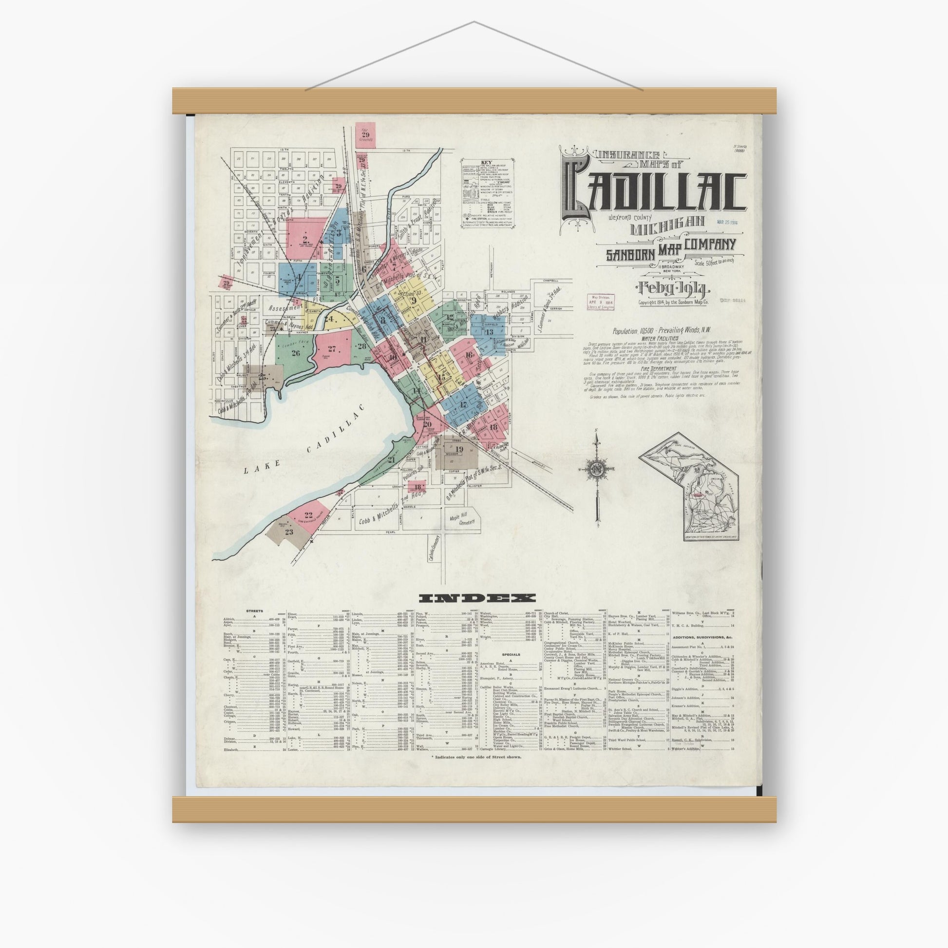Old map wall art mockup — magnetic wood frame on white wall — Sanborn Fire Insurance Map from Cadillac, Wexford County, Michigan (1914) - Complete Map Set