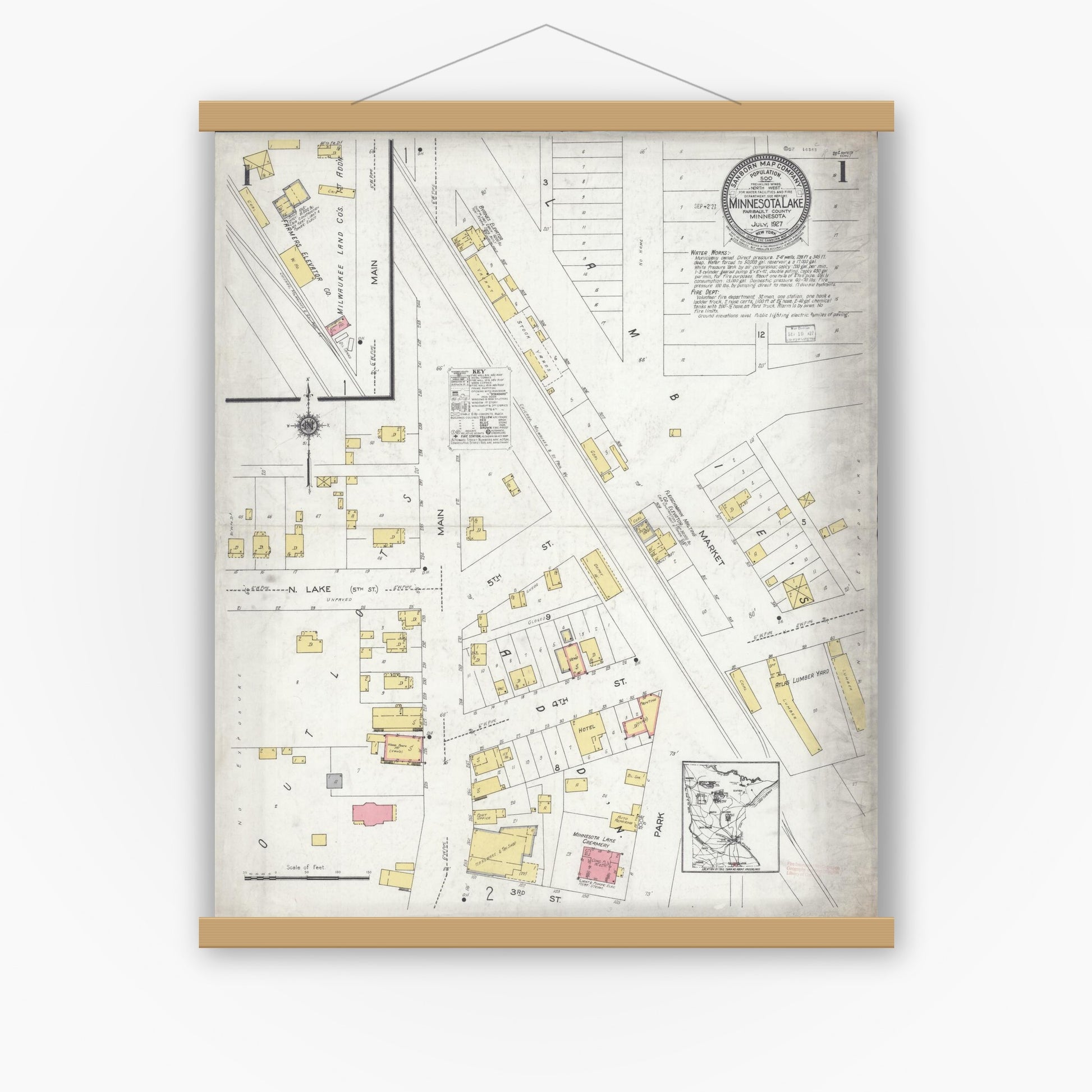 Old map wall art mockup — magnetic wood frame on white wall — Sanborn Fire Insurance Map from Minnesota Lake, Faribault County, Minnesota (1927) - Complete Map Set