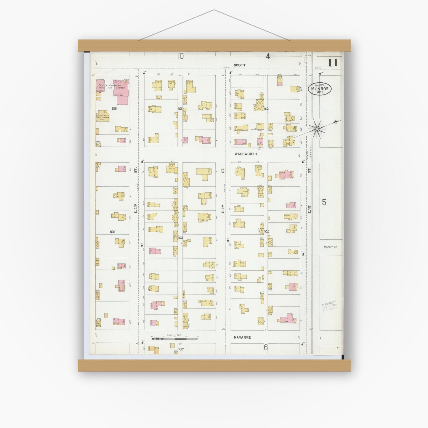 Old map wall art mockup — magnetic wood frame on white wall — Sanborn Fire Insurance Map from Monroe, Monroe County, Michigan (1899), Sheet #0011