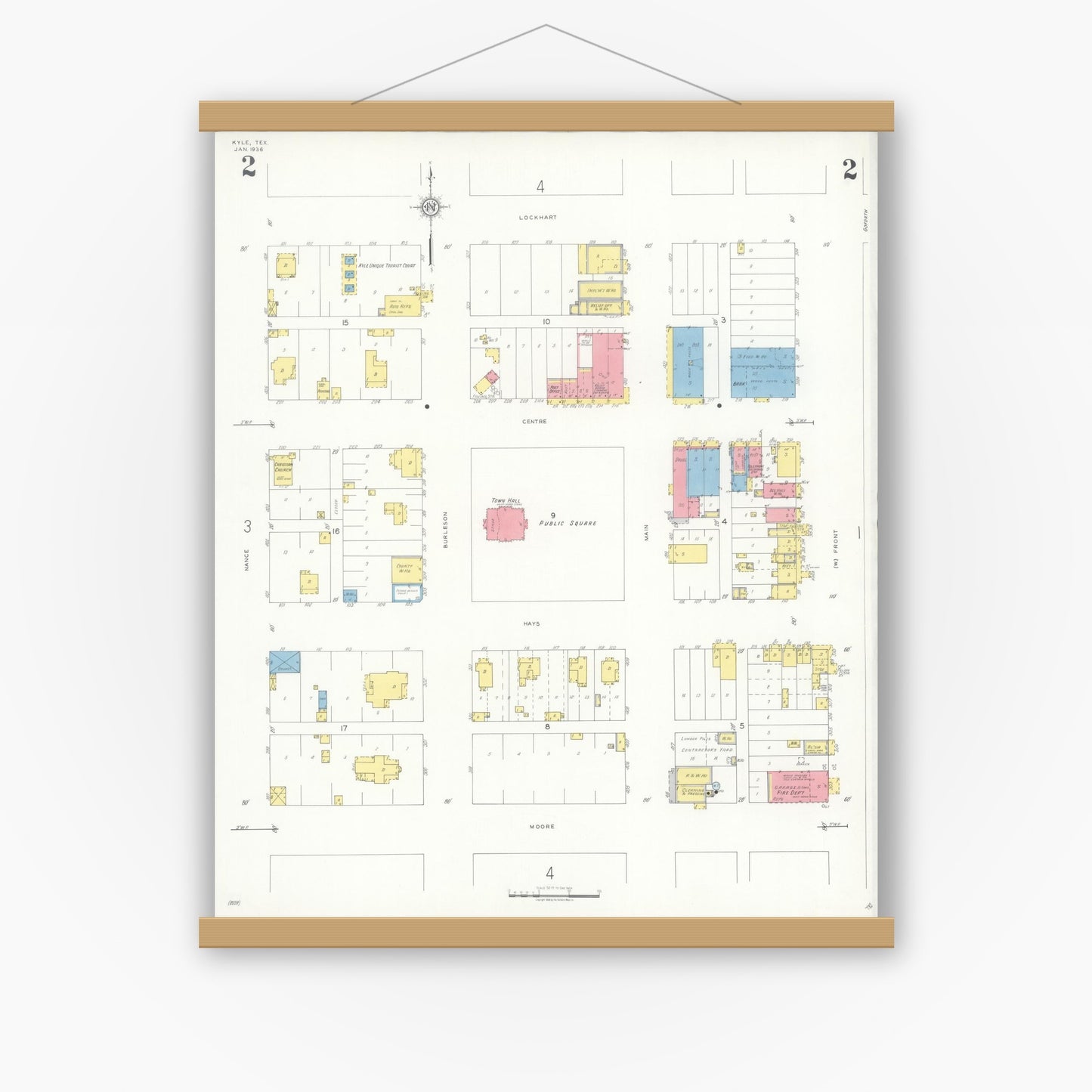 Old map wall art mockup — magnetic wood frame on white wall — Sanborn Fire Insurance Map from Kyle, Hays County, Texas (1936), Sheet #0002