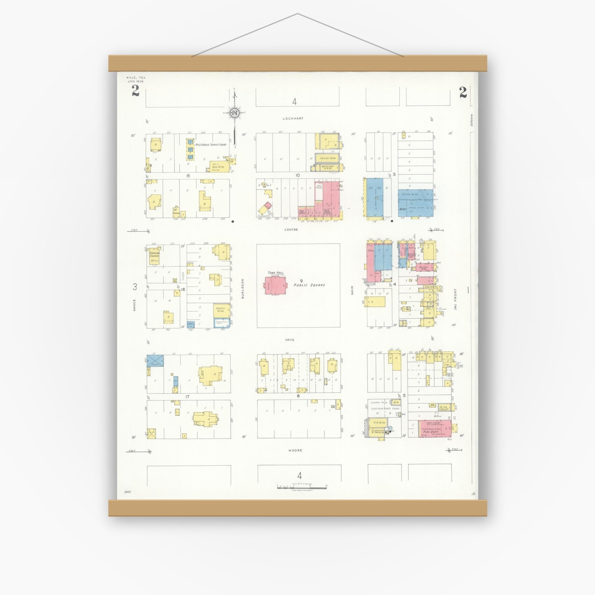 Old map wall art mockup — magnetic wood frame on white wall — Sanborn Fire Insurance Map from Kyle, Hays County, Texas (1936), Sheet #0002