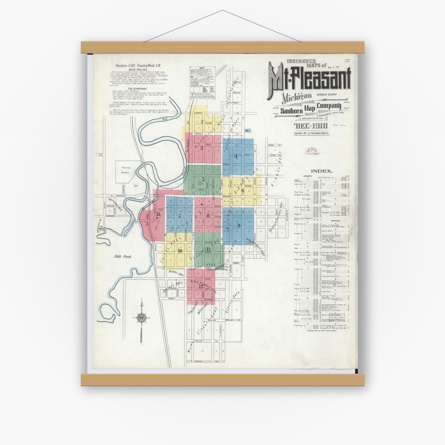 Old map wall art mockup — magnetic wood frame on white wall — Sanborn Fire Insurance Map from Mount Pleasant, Isabella County, Michigan (1910) - Complete Map Set
