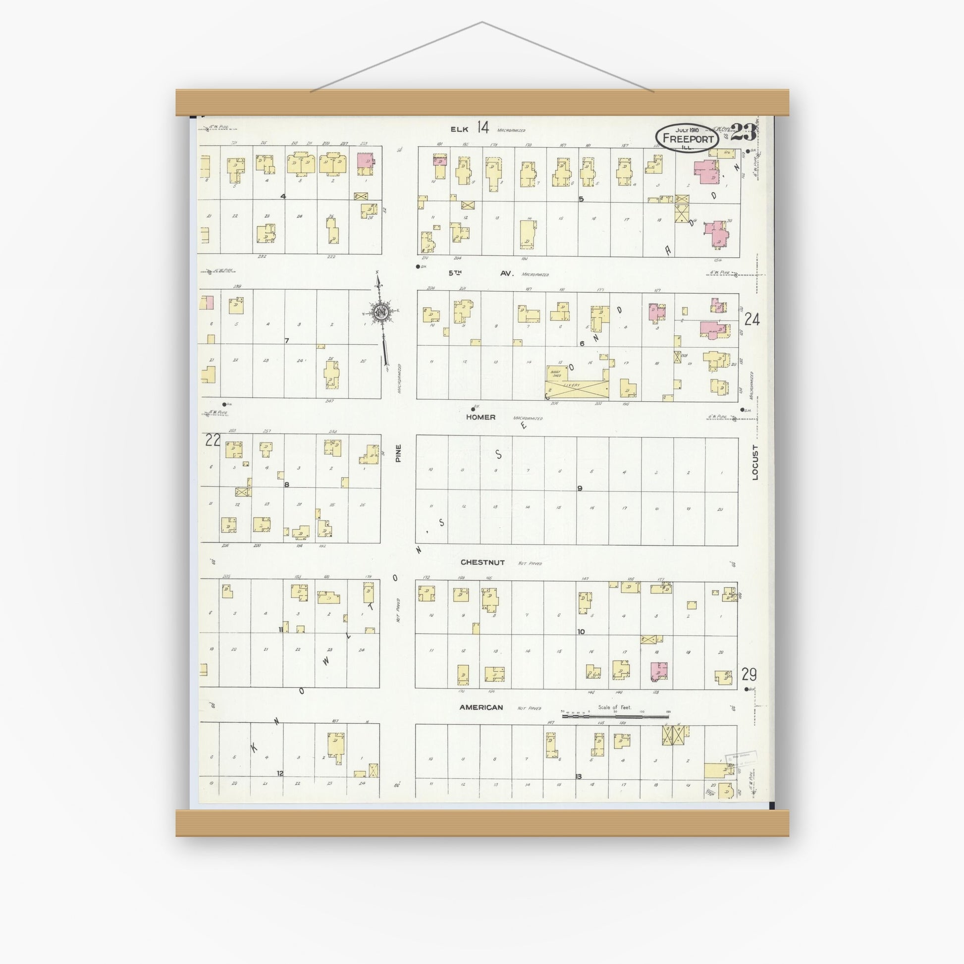 Old map wall art mockup — magnetic wood frame on white wall — Sanborn Fire Insurance Map from Freeport, Stephenson County, Illinois (1910), Sheet #0023