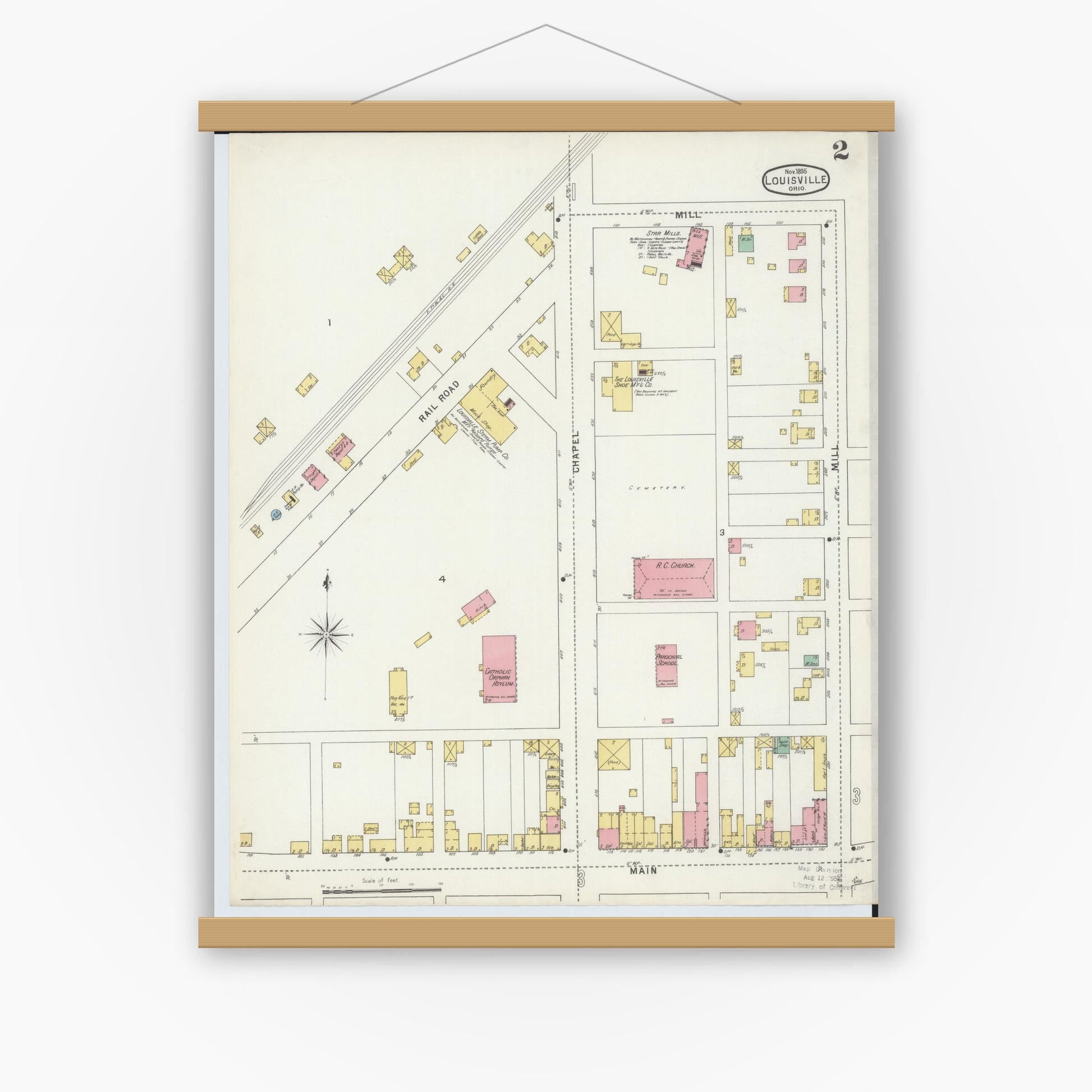 Old map wall art mockup — magnetic wood frame on white wall — Sanborn Fire Insurance Map from Louisville, Stark County, Ohio (1895), Sheet #0002