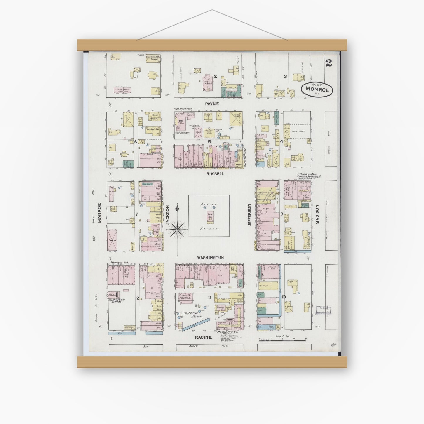 Old map wall art mockup — magnetic wood frame on white wall — Sanborn Fire Insurance Map from Monroe, Green County, Wisconsin (1889), Sheet #0002