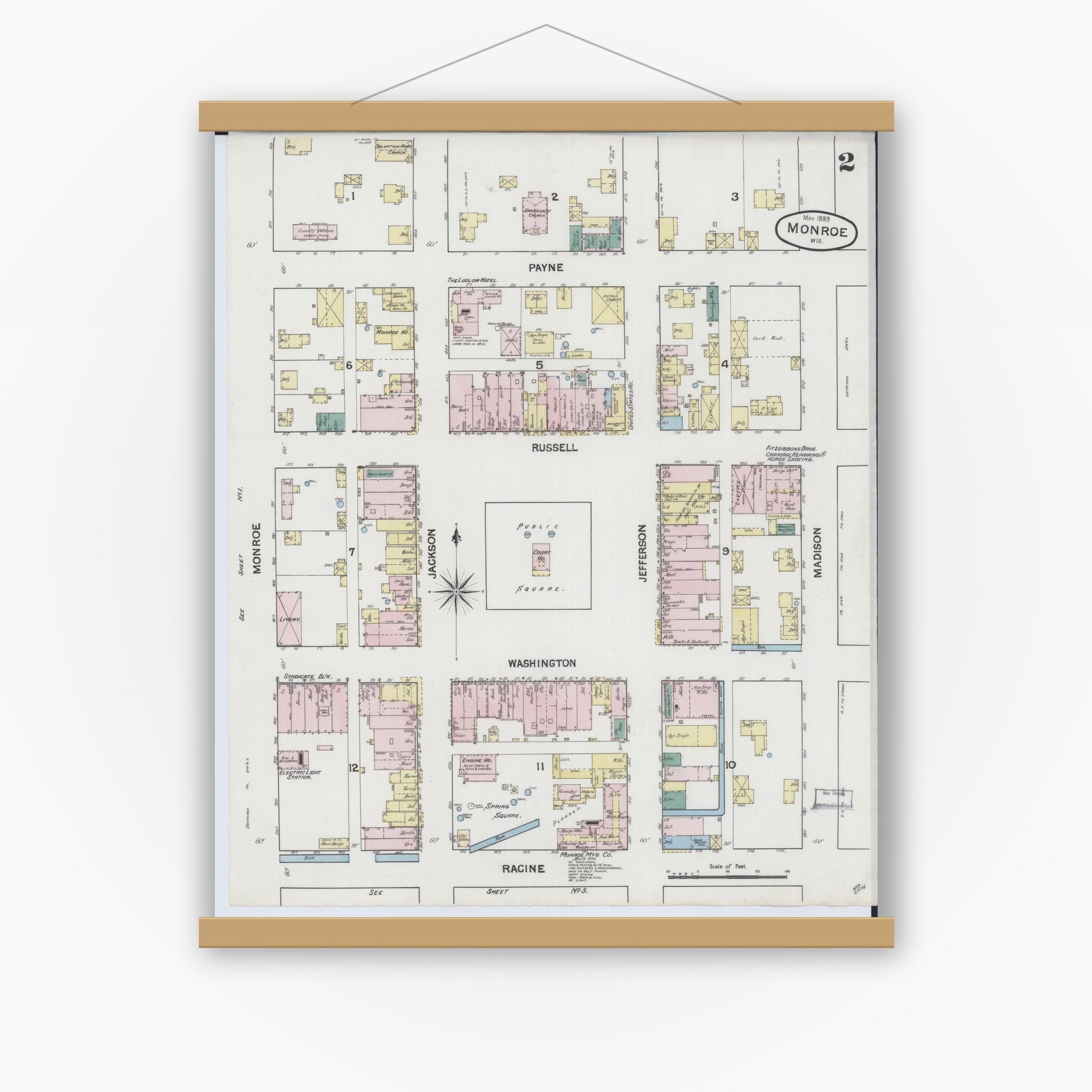 Old map wall art mockup — magnetic wood frame on white wall — Sanborn Fire Insurance Map from Monroe, Green County, Wisconsin (1889), Sheet #0002