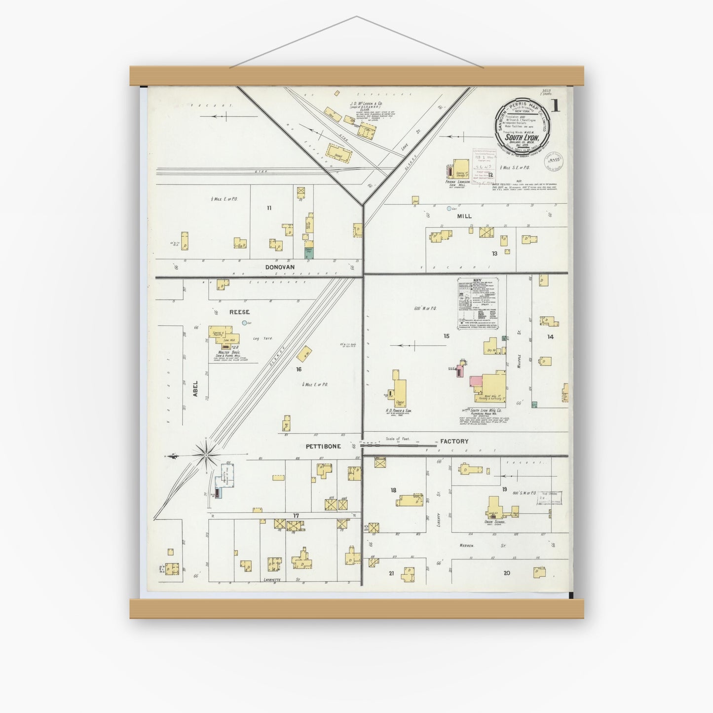 Old map wall art mockup — magnetic wood frame on white wall — Sanborn Fire Insurance Map from South Lyon, Oakland County, Michigan (1899), Sheet #0001