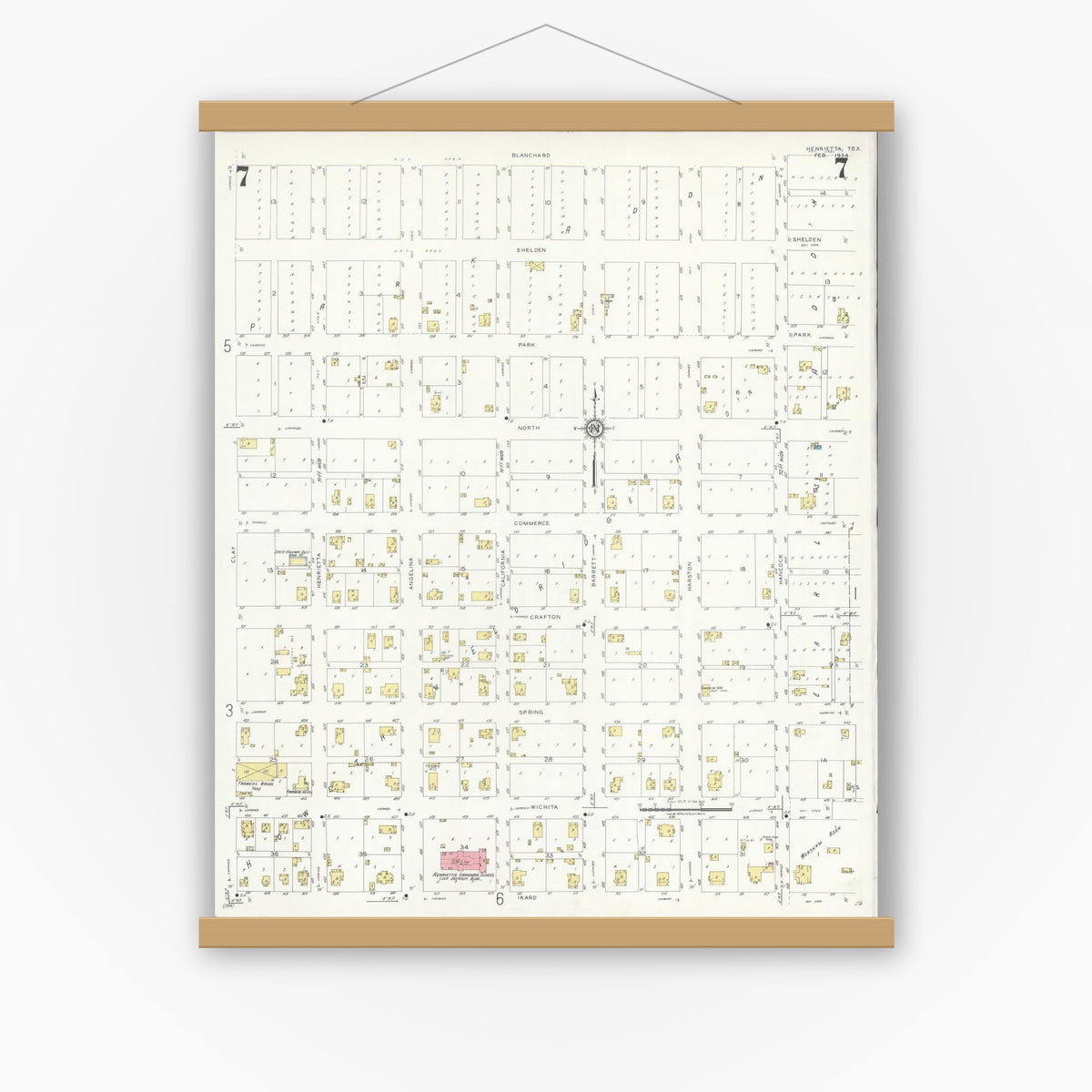 Old map wall art mockup — magnetic wood frame on white wall — Sanborn Fire Insurance Map from Henrietta, Clay County, Texas (1934), Sheet #0007