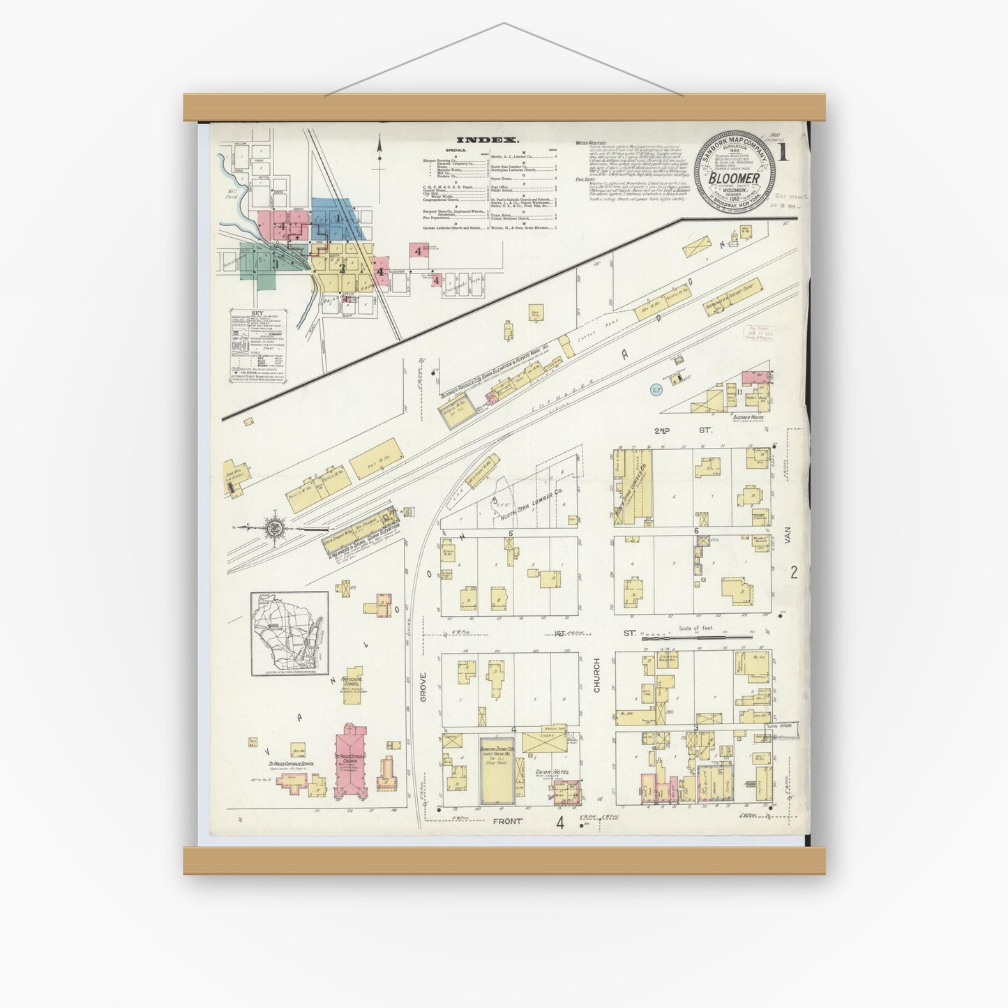 Old map wall art mockup — magnetic wood frame on white wall — Sanborn Fire Insurance Map from Bloomer, Chippewa County, Wisconsin (1912), Sheet #0001
