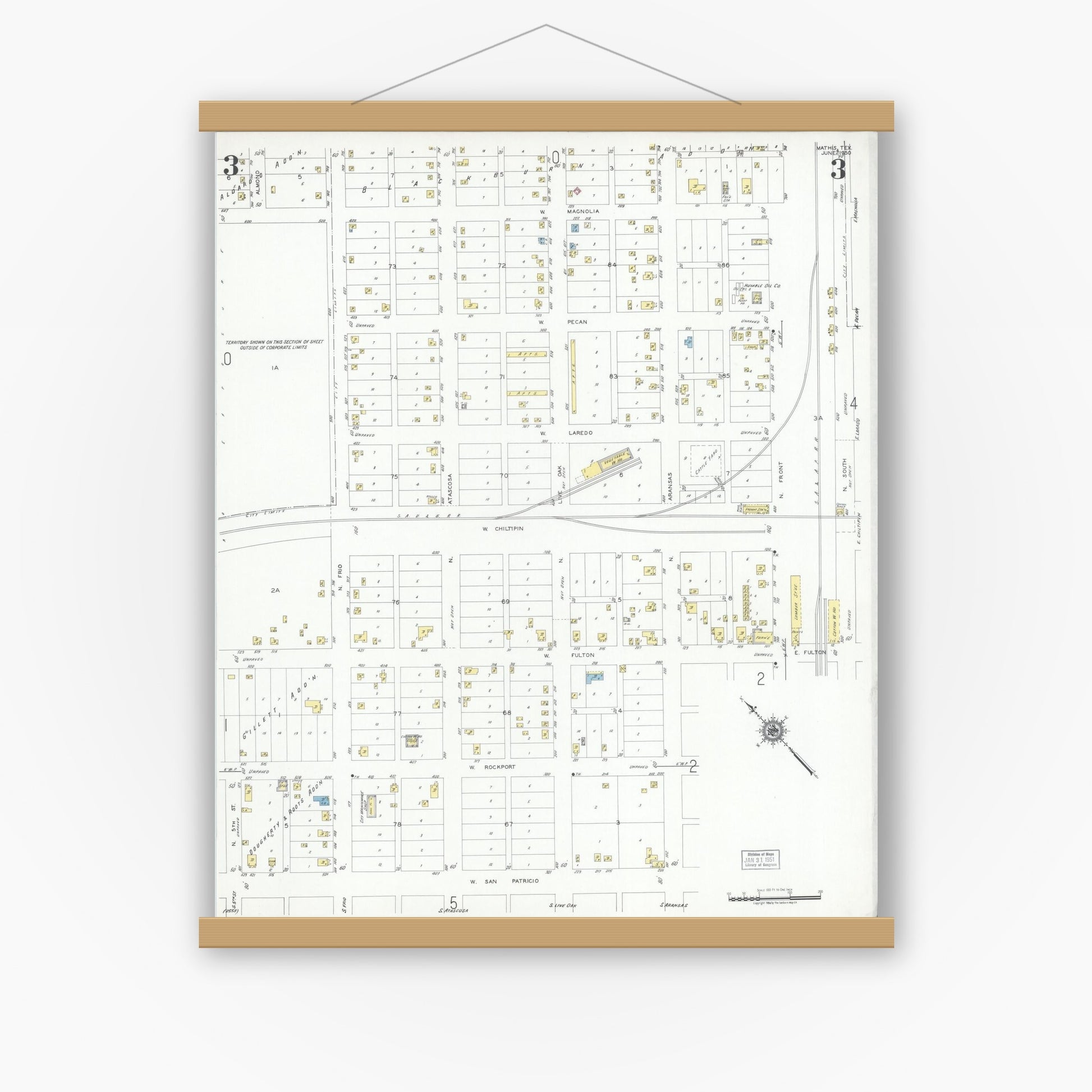 Old map wall art mockup — magnetic wood frame on white wall — Sanborn Fire Insurance Map from Mathis, San Patricio County, Texas (1950), Sheet #0003