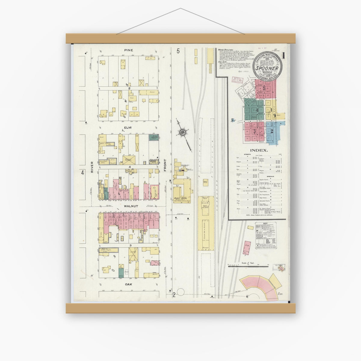 Old map wall art mockup — magnetic wood frame on white wall — Sanborn Fire Insurance Map from Spooner, Washburn County, Wisconsin (1909) - Complete Map Set