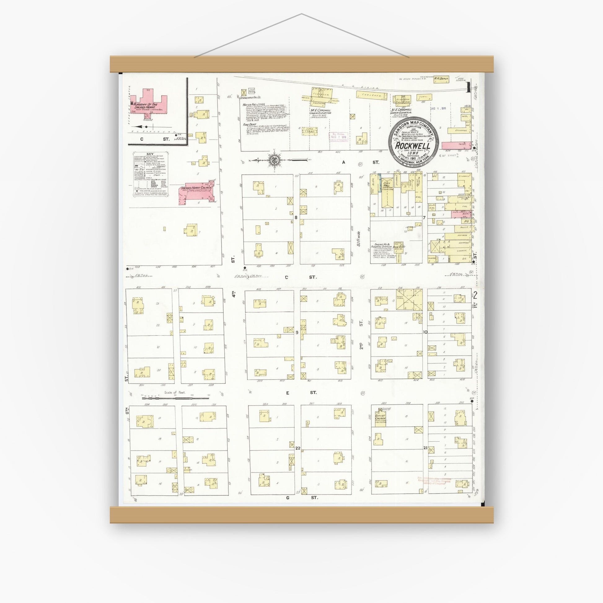 Old map wall art mockup — magnetic wood frame on white wall — Sanborn Fire Insurance Map from Rockwell, Cerro Gordo County, Iowa (1911), Sheet #0001