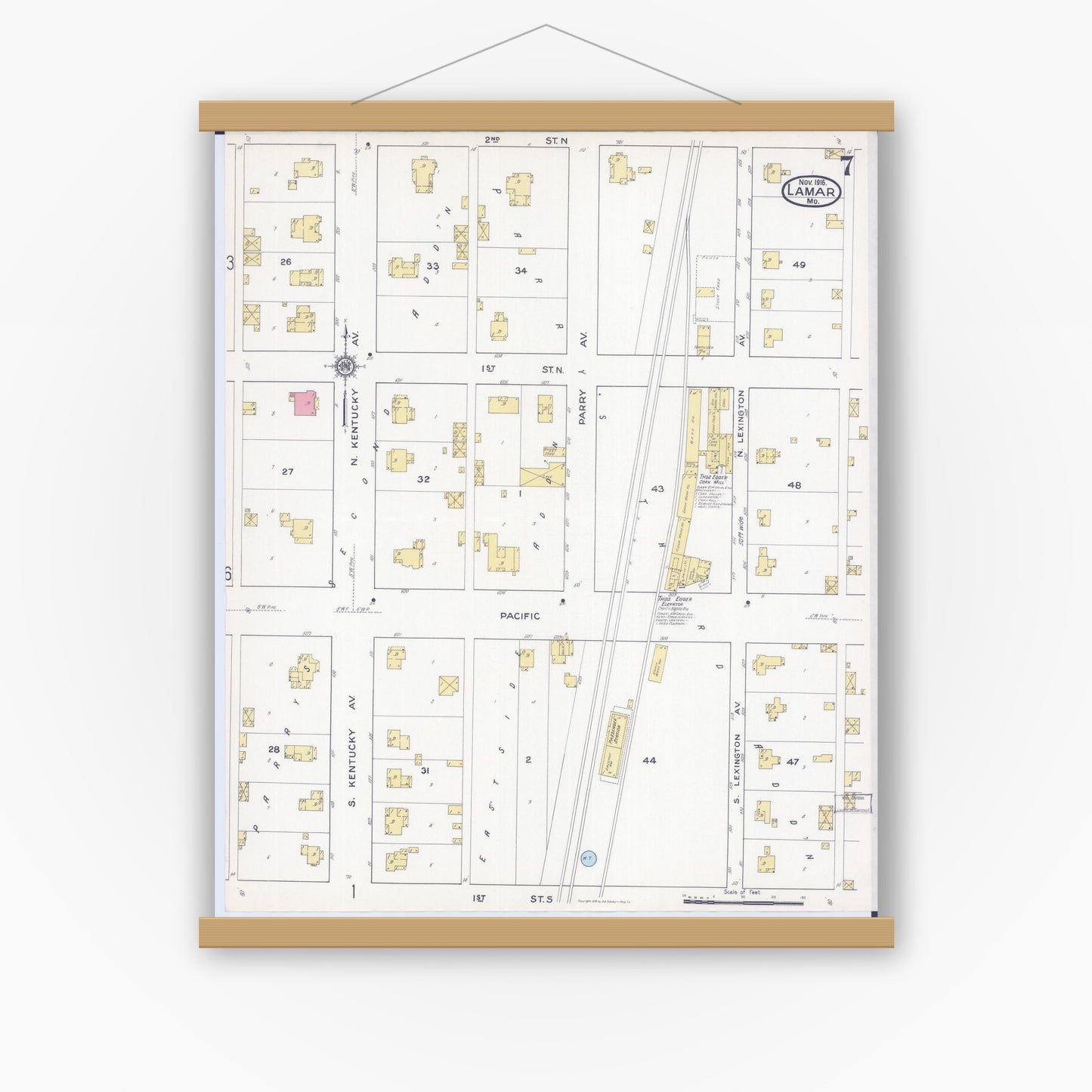 Old map wall art mockup — magnetic wood frame on white wall — Sanborn Fire Insurance Map from Lamar, Barton County, Missouri (1916), Sheet #0007