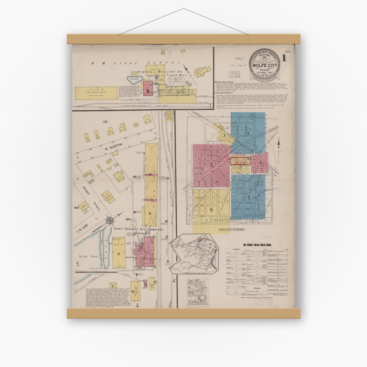 Old map wall art mockup — magnetic wood frame on white wall — Sanborn Fire Insurance Map from Wolfe City, Hunt County, Texas (1922) - Complete Map Set