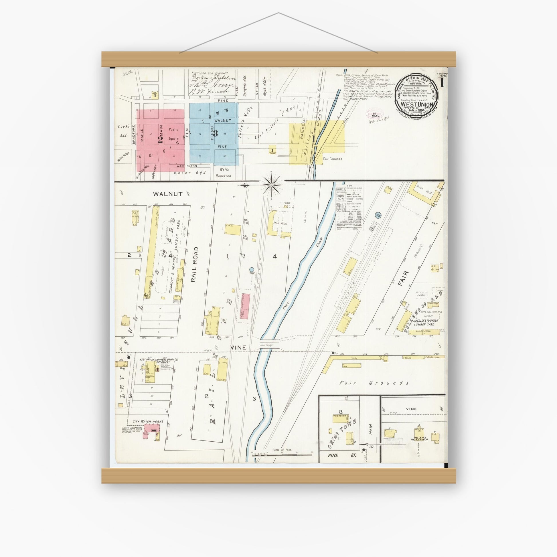 Old map wall art mockup — magnetic wood frame on white wall — Sanborn Fire Insurance Map from West Union, Fayette County, Iowa (1894), Sheet #0001