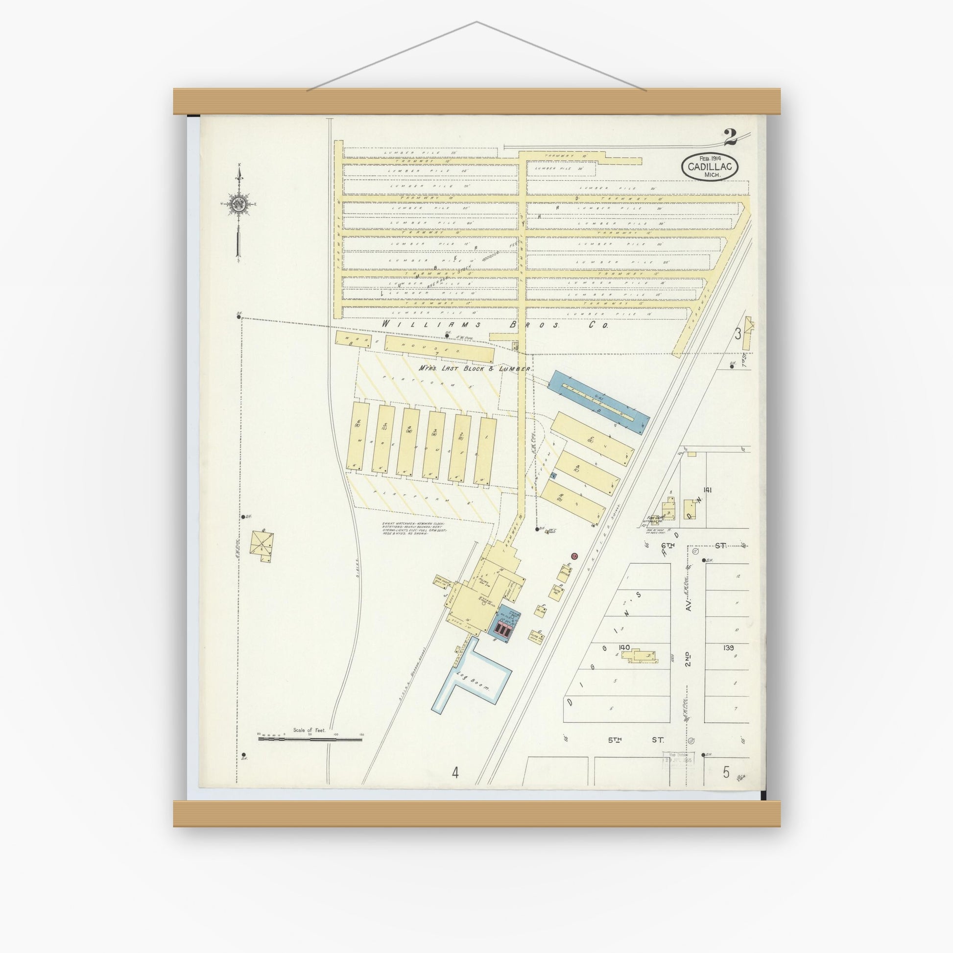 Old map wall art mockup — magnetic wood frame on white wall — Sanborn Fire Insurance Map from Cadillac, Wexford County, Michigan (1914), Sheet #0002