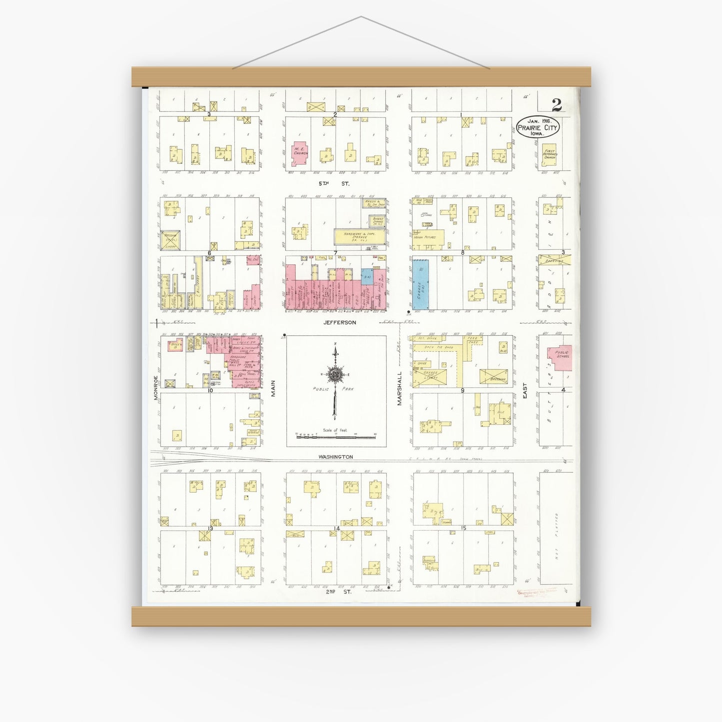 Old map wall art mockup — magnetic wood frame on white wall — Sanborn Fire Insurance Map from Prairie City, Jasper County, Iowa (1916), Sheet #0002