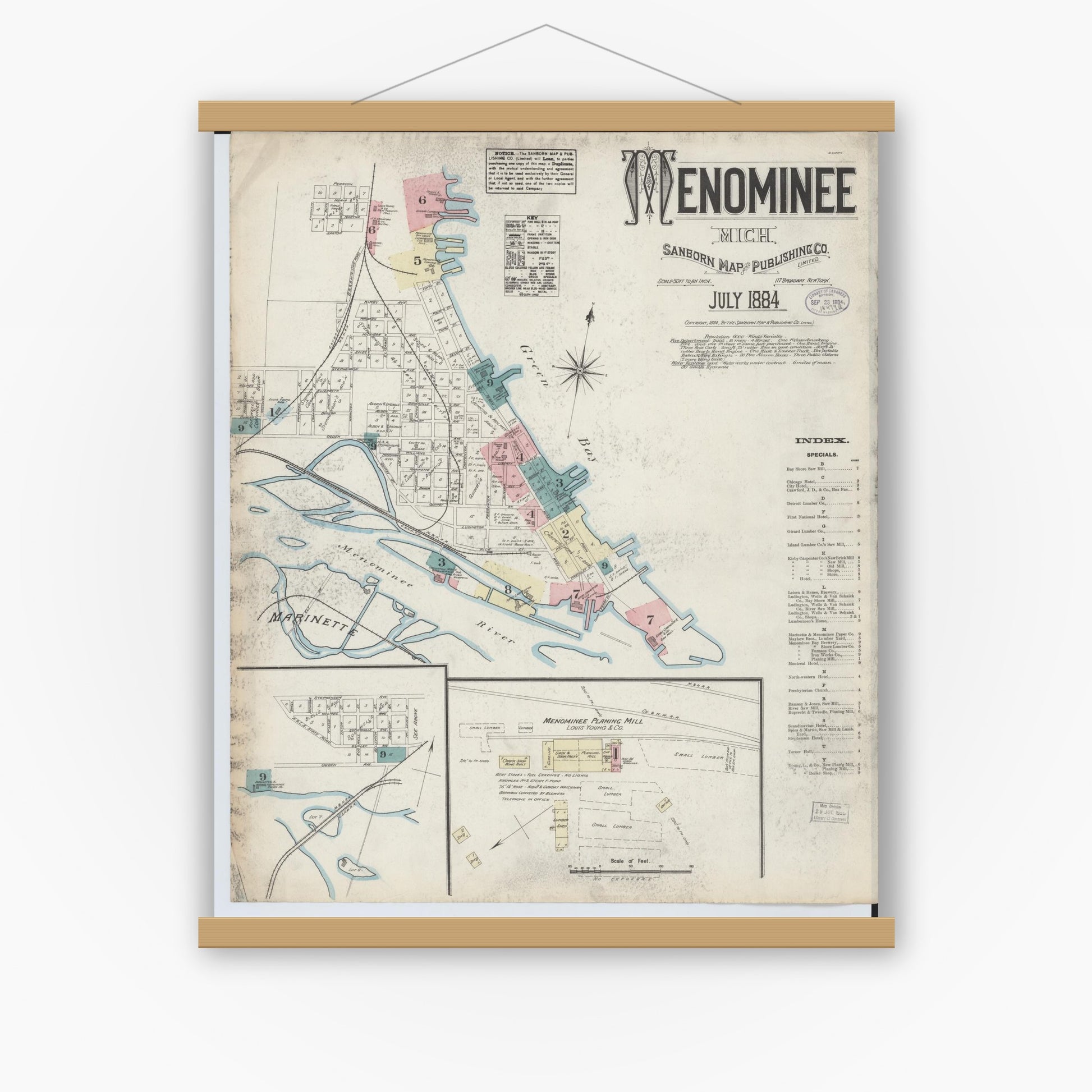 Old map wall art mockup — magnetic wood frame on white wall — Sanborn Fire Insurance Map from Menominee, Menominee County, Michigan (1884) - Complete Map Set