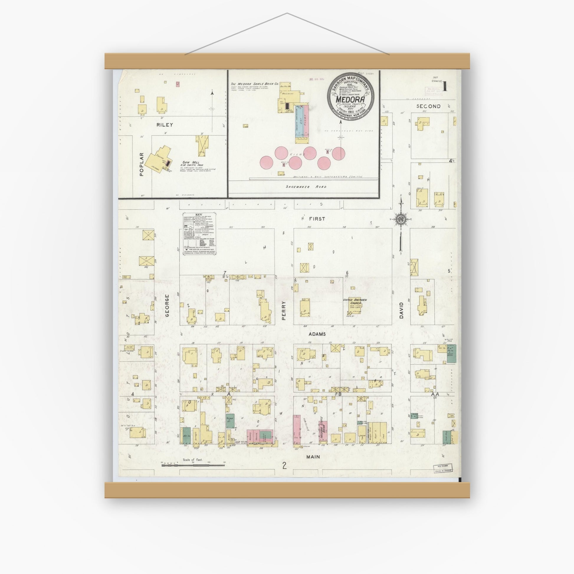 Old map wall art mockup — magnetic wood frame on white wall — Sanborn Fire Insurance Map from Medora, Jackson County, Indiana (1910) - Complete Map Set