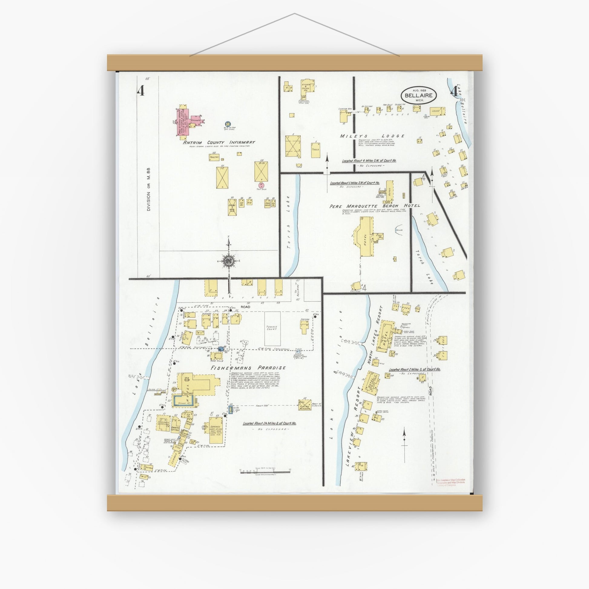 Old map wall art mockup — magnetic wood frame on white wall — Sanborn Fire Insurance Map from Bellaire, Antrim County, Michigan (1929), Sheet #0004