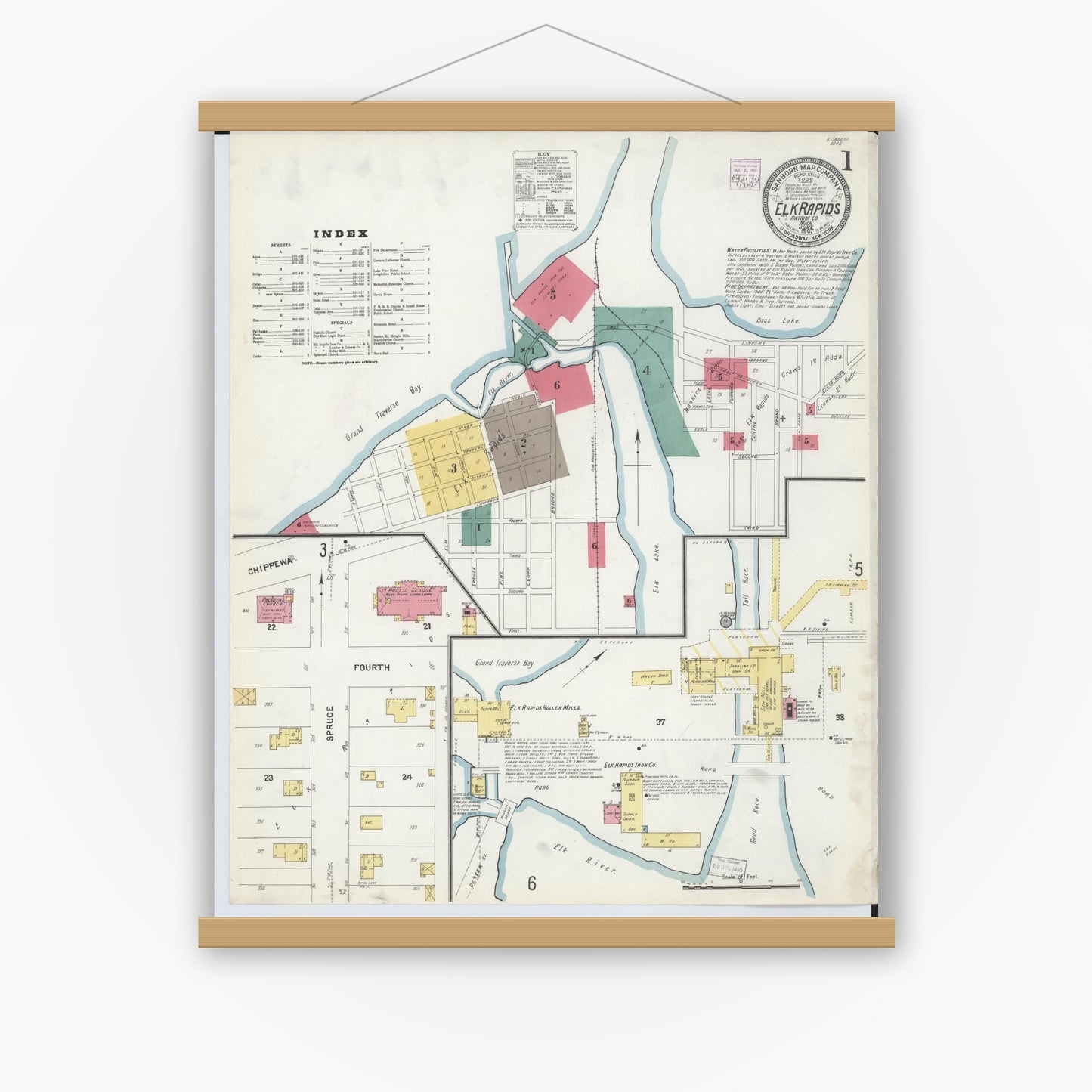 Old map wall art mockup — magnetic wood frame on white wall — Sanborn Fire Insurance Map from Elk Rapids, Antrim County, Michigan (1907) - Complete Map Set