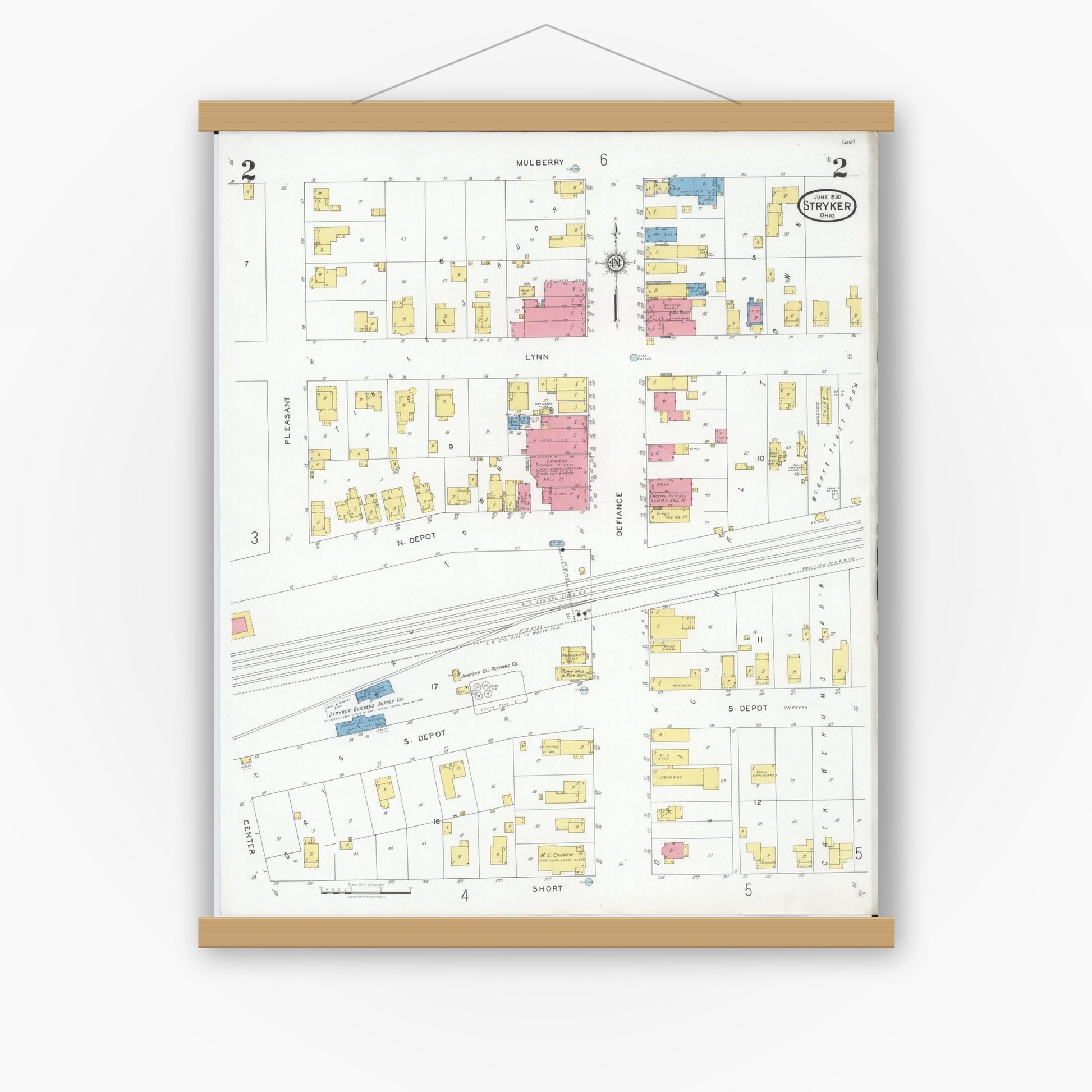Old map wall art mockup — magnetic wood frame on white wall — Sanborn Fire Insurance Map from Stryker, Williams County, Ohio (1930), Sheet #0002